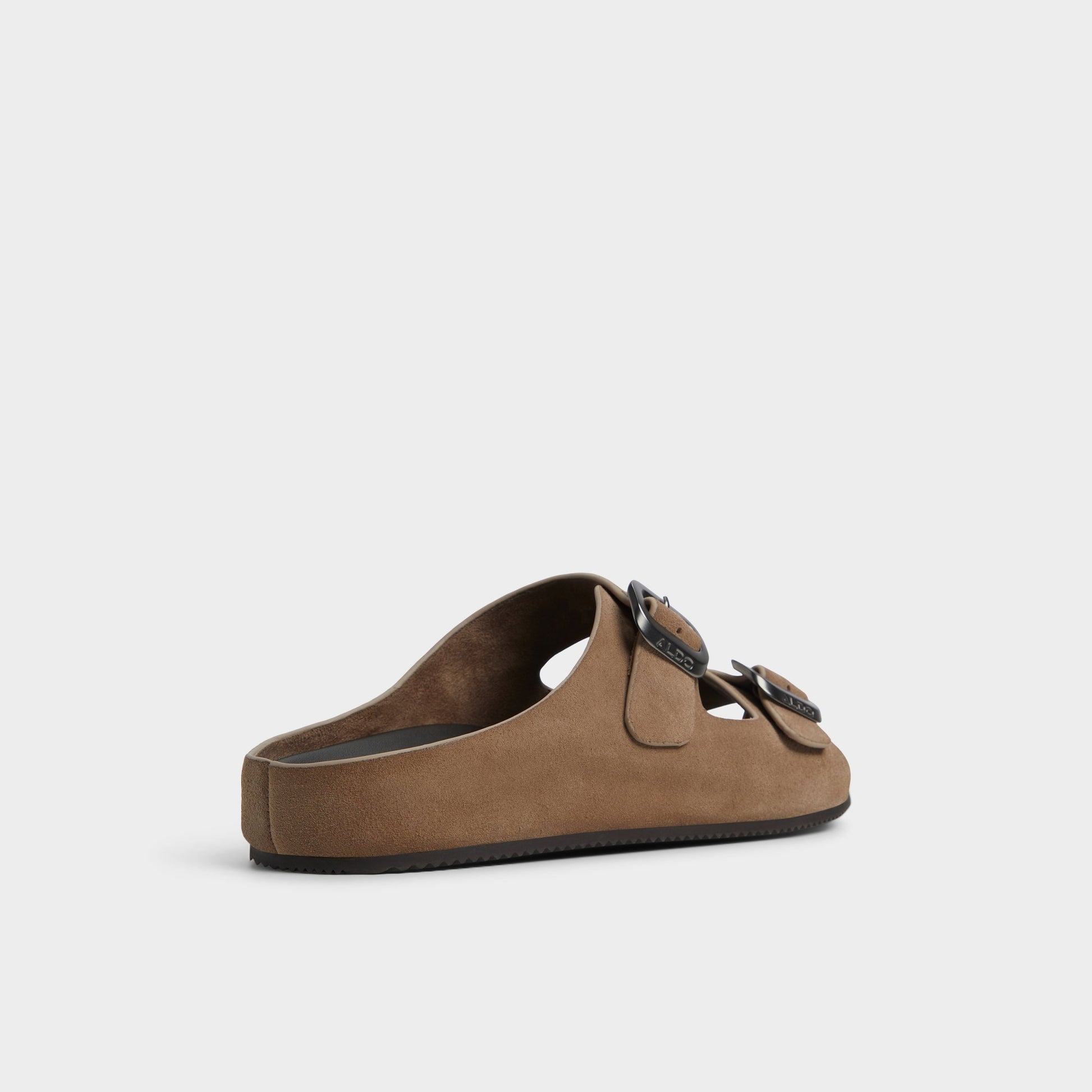 Three-quarter angle of Other Brown Kennebunk Slide sandal's back side