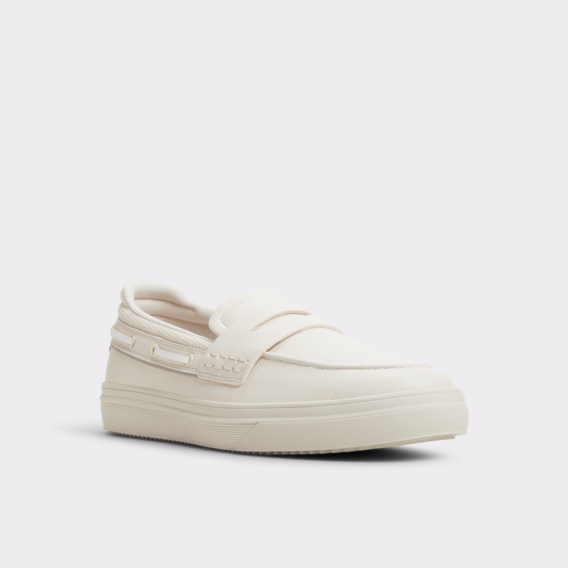 Three-quarter angle of Light Beige Seafarer Boat shoe's front side