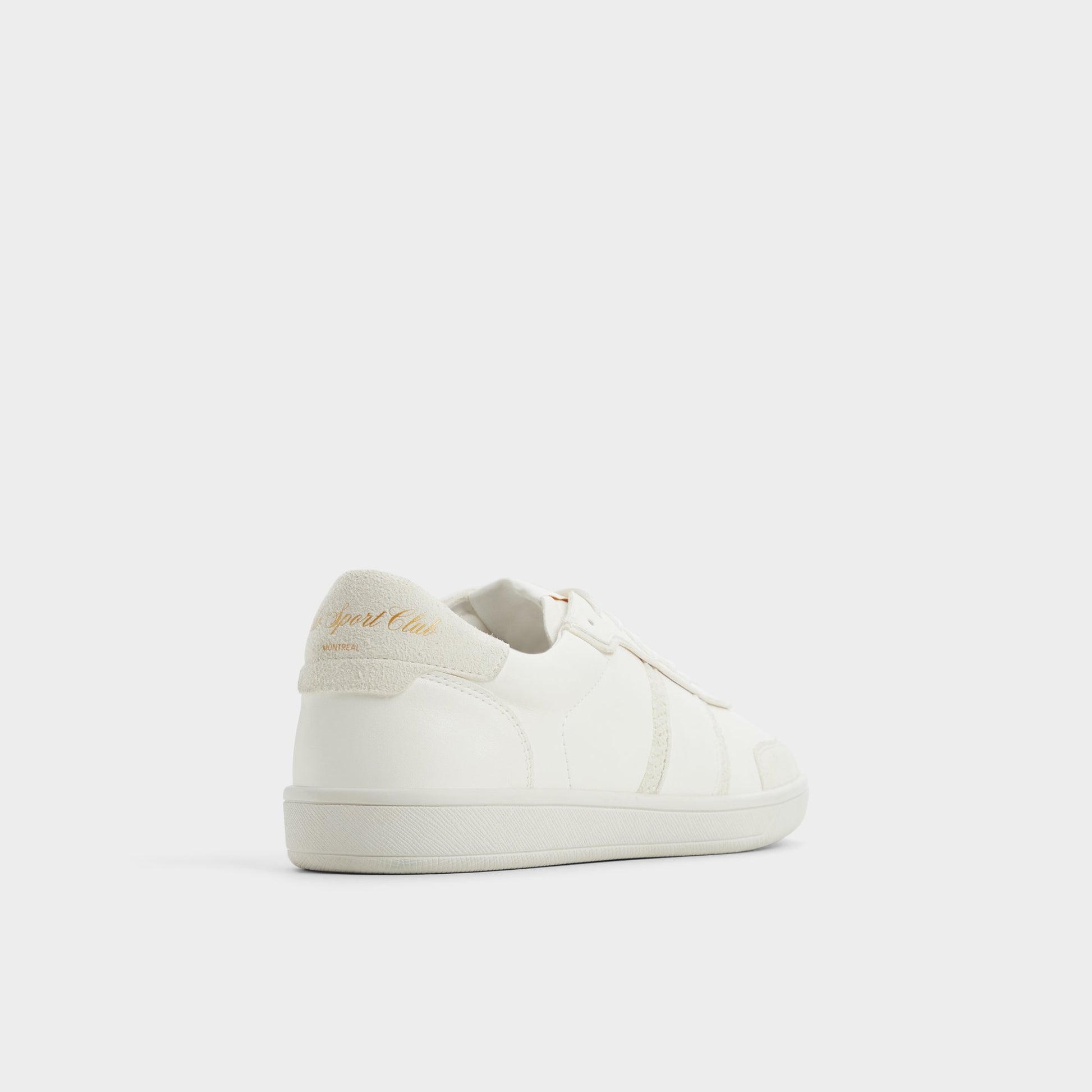 Three-quarter angle of Open White Uptown Low top sneaker's back side
