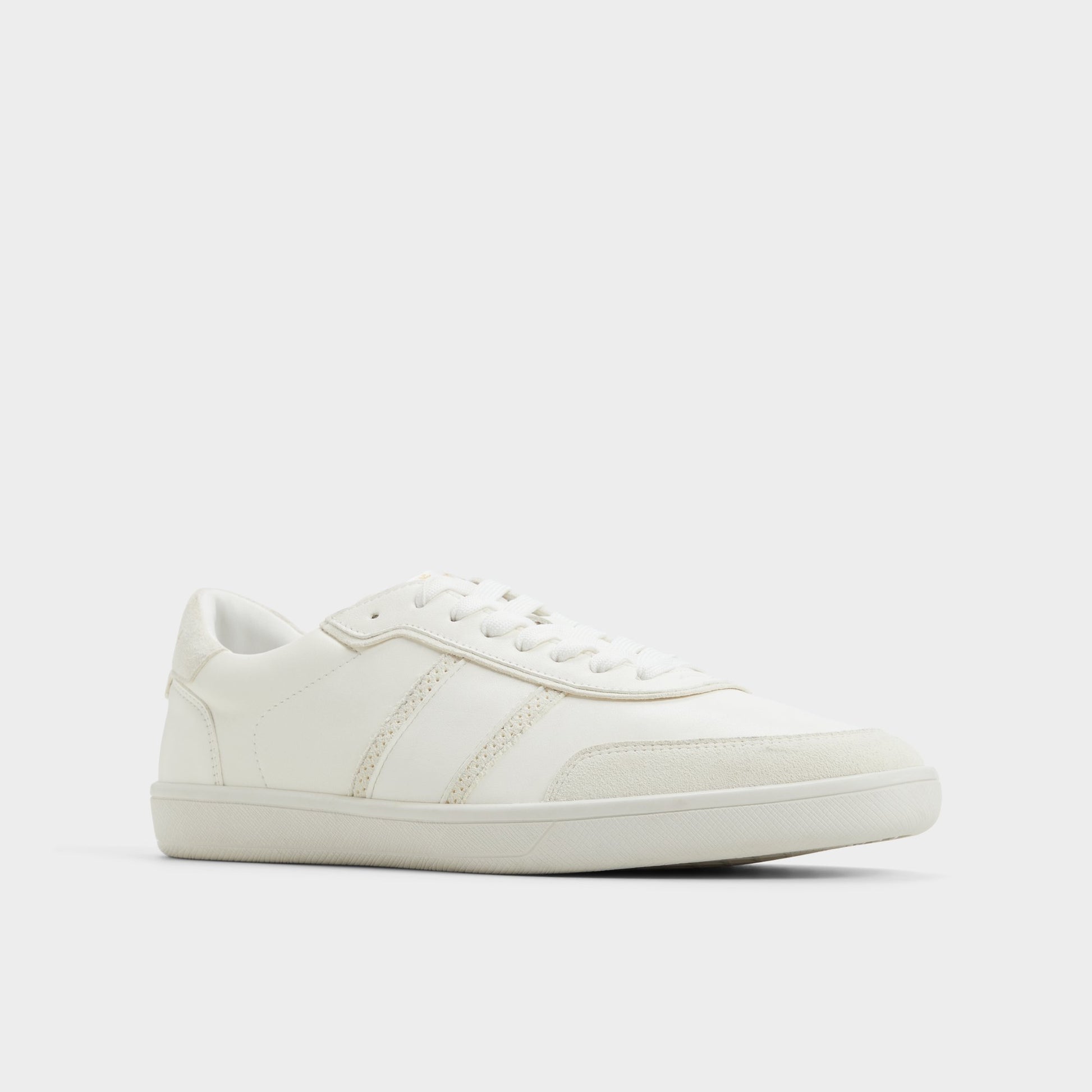 Three-quarter angle of Open White Uptown Low top sneaker's front side