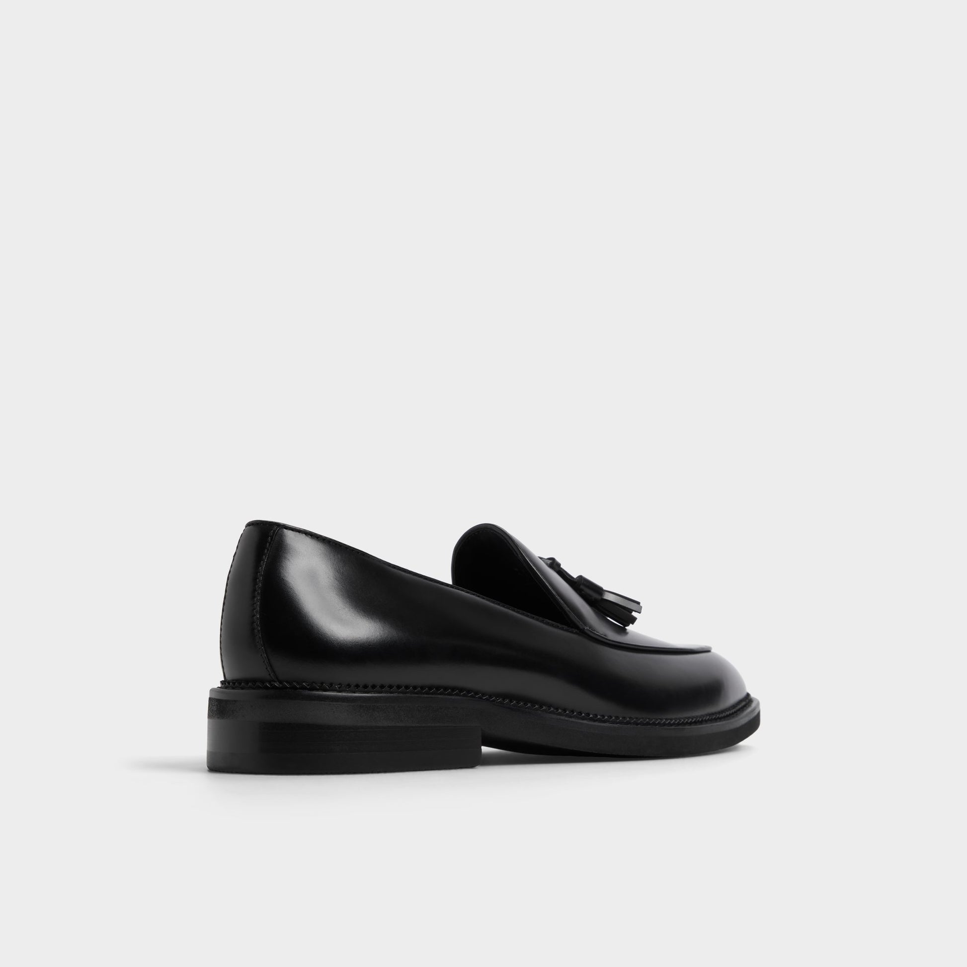Three-quarter angle of Black Portos Loafer's back side