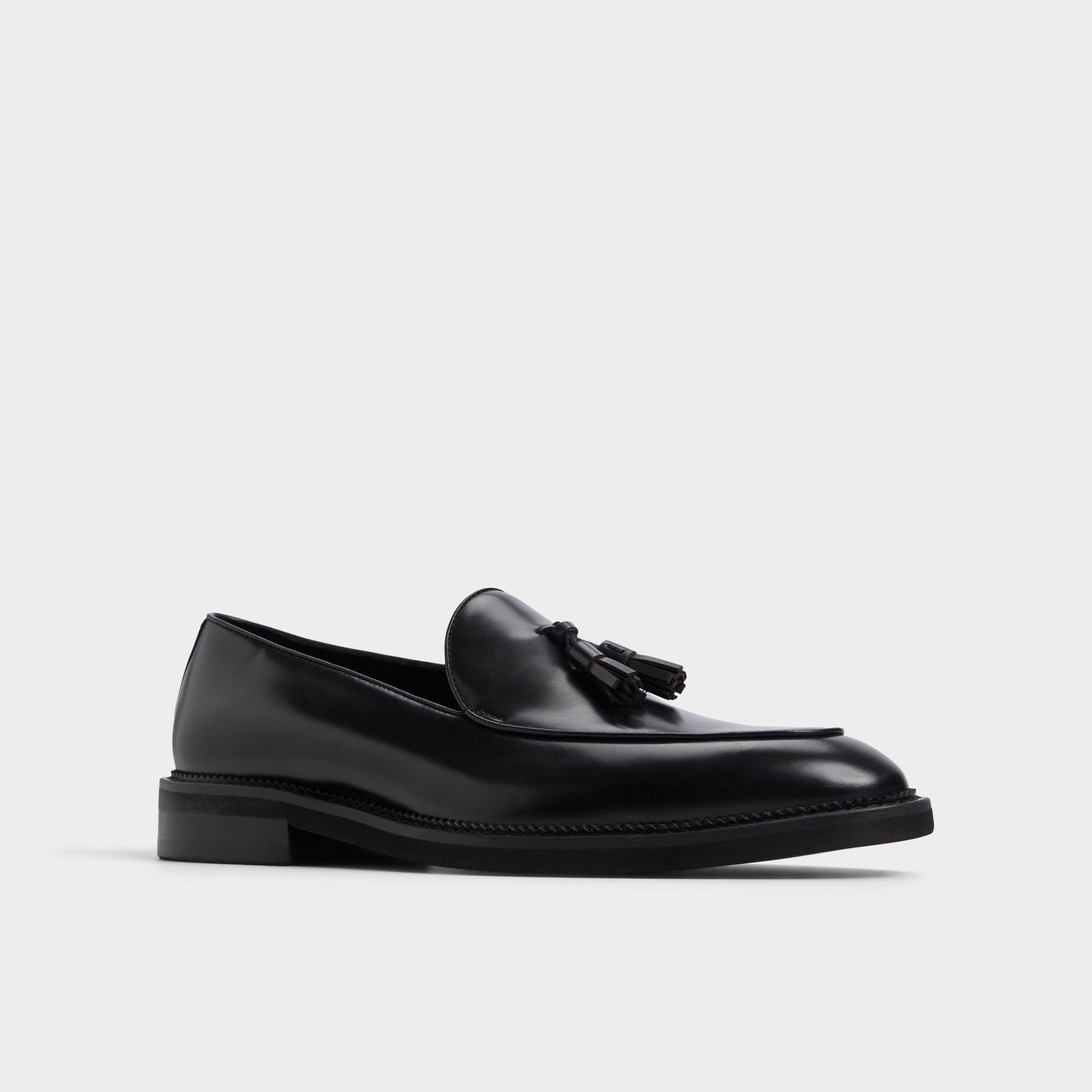 Three-quarter angle of Black Portos Loafer's front side