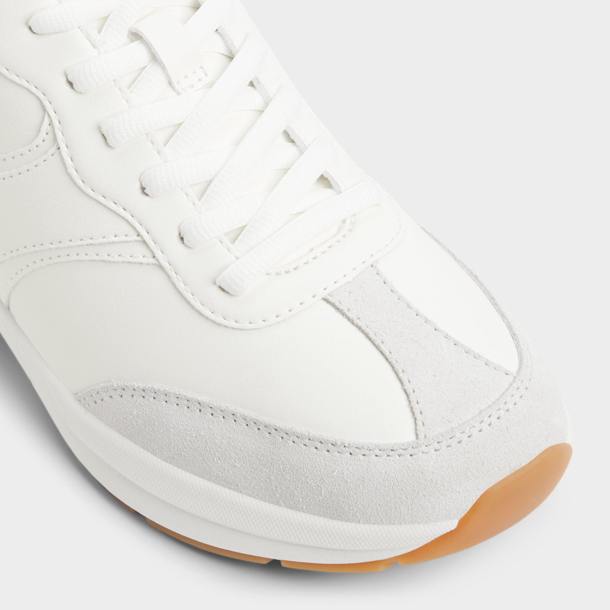 Close-up of the White Combo Clubchic Jogger sneaker