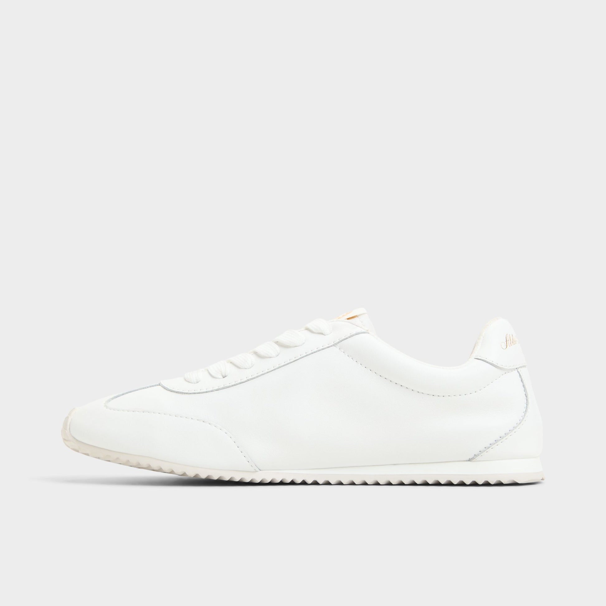 Side view of White Carefree Jogger sneaker