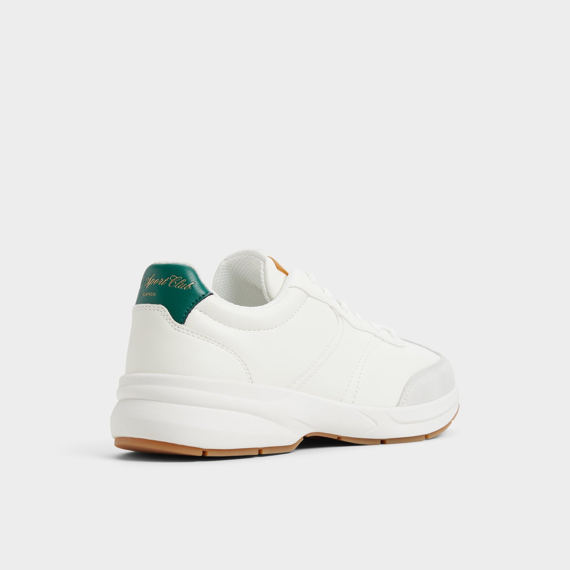 Three-quarter angle of White Combo Clubchic Jogger sneaker's back side