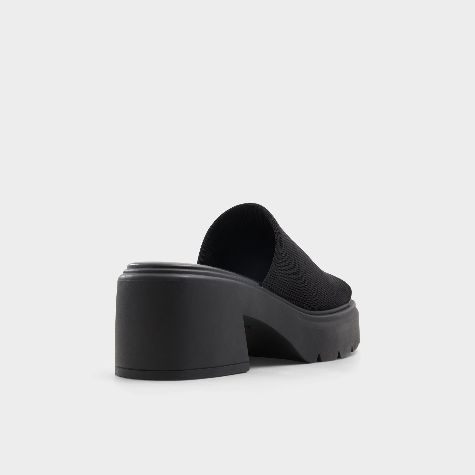 Three-quarter angle of Black Harrietta Heeled mule's back side