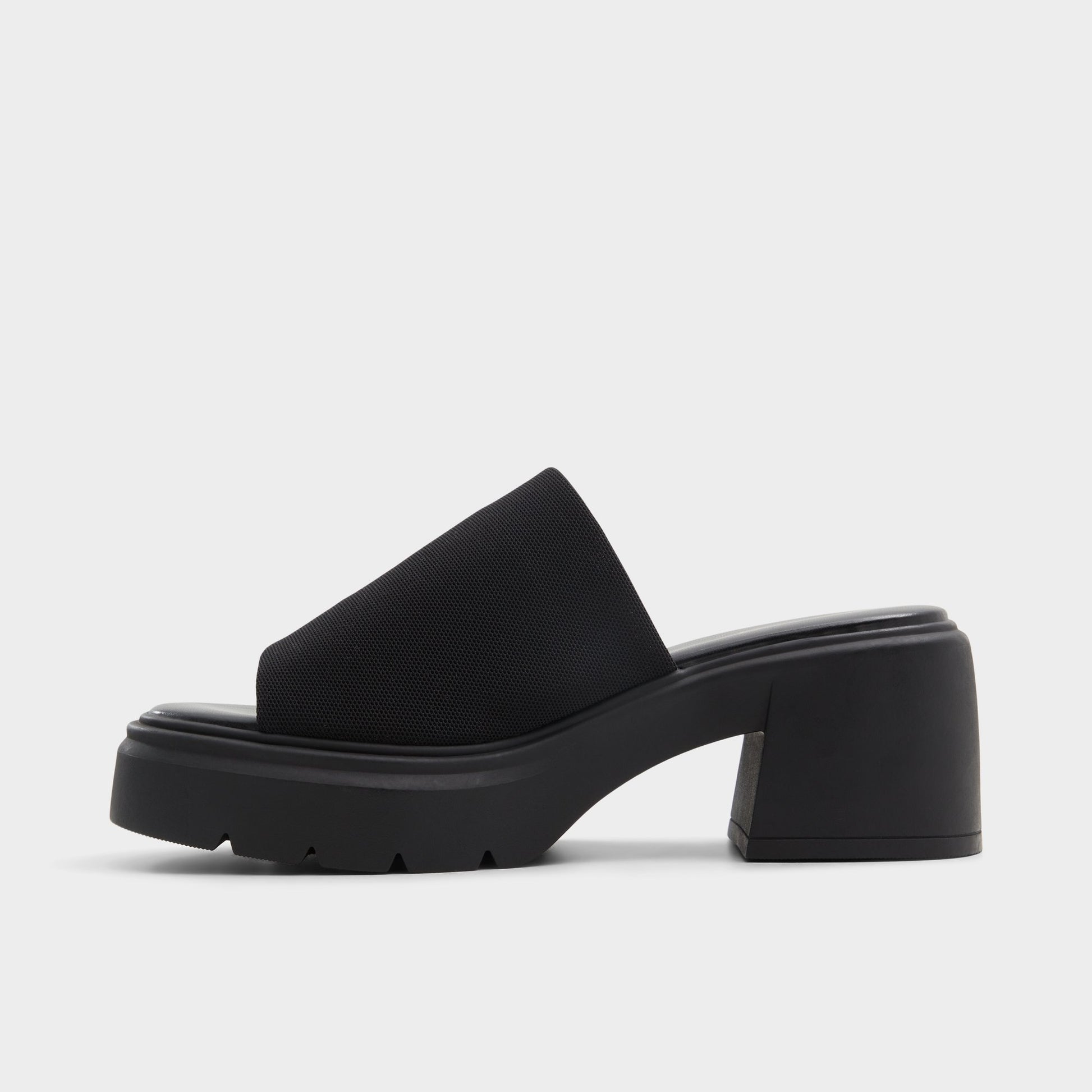 Side view of Black Harrietta Heeled mule