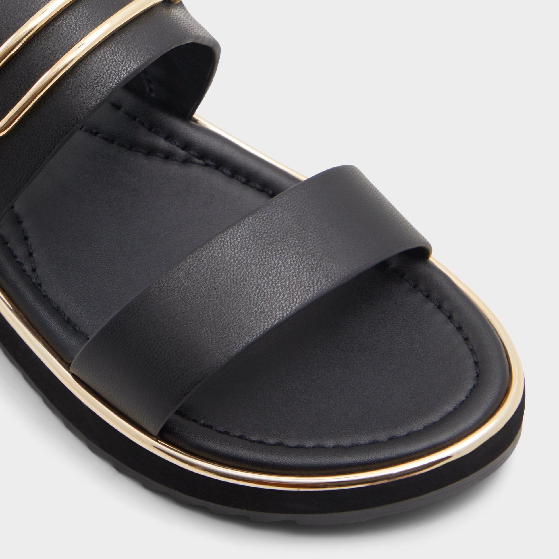 Close-up of the Other Black Lagoon Strappy flat sandal