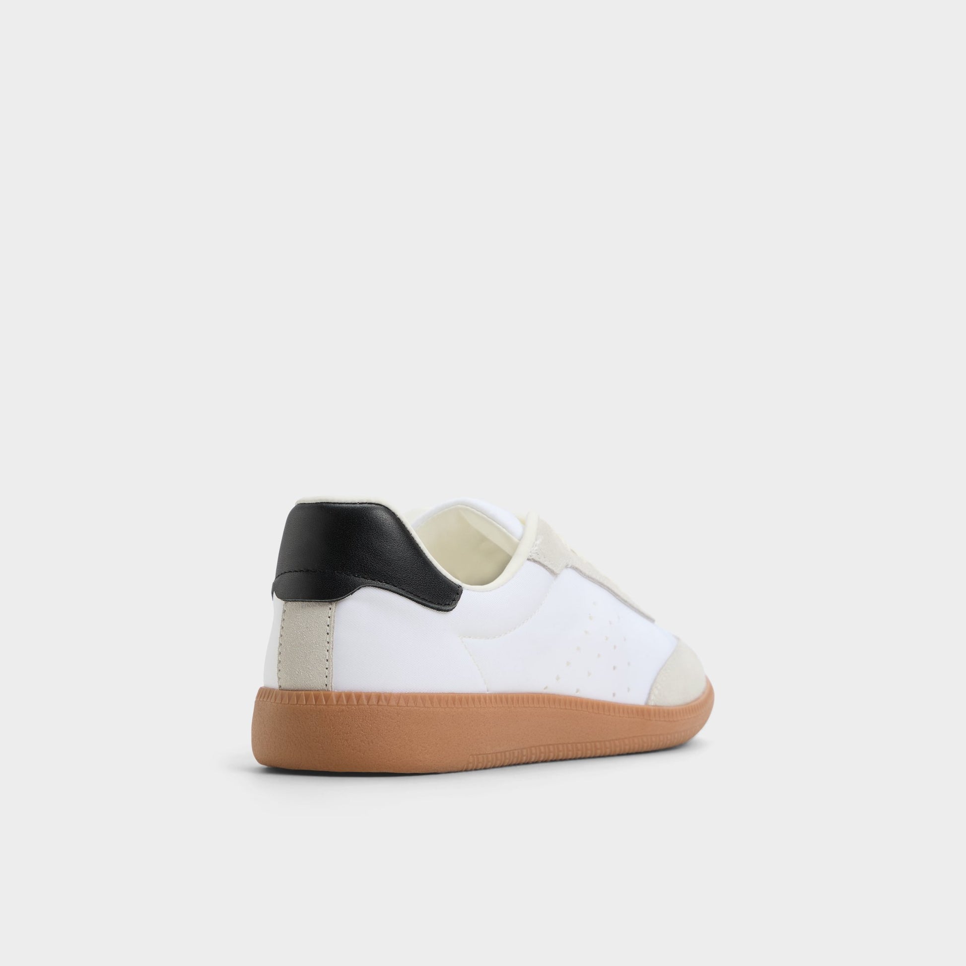 Three-quarter angle of White/Black Clubstyle Jogger sneaker's back side