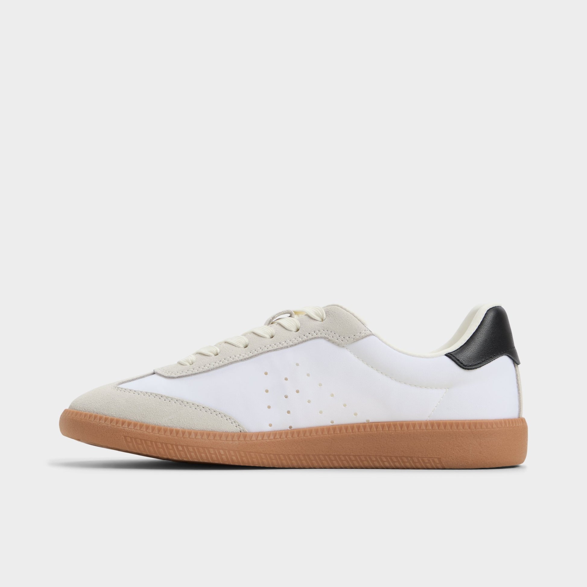 Side view of White/Black Clubstyle Jogger sneaker