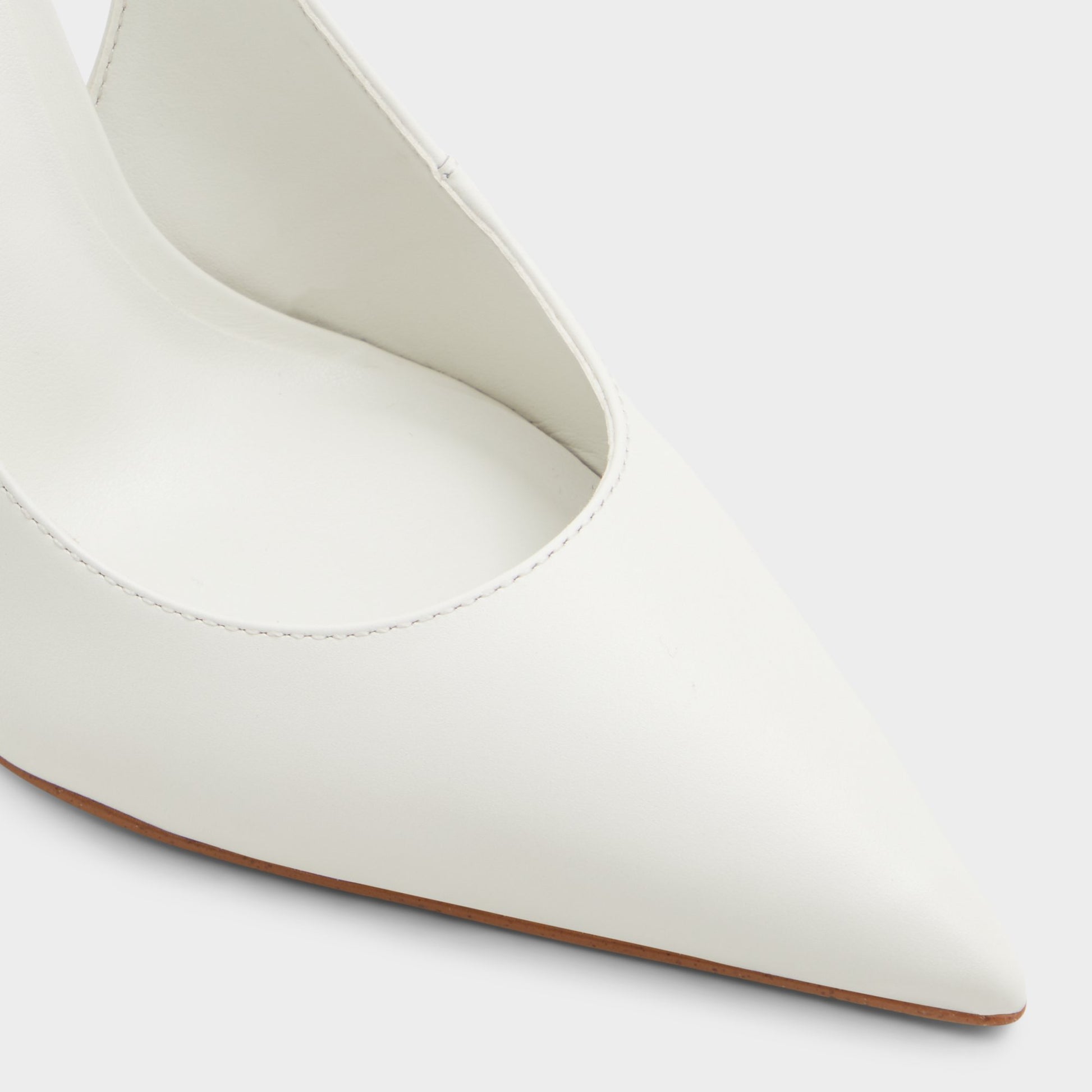 Close-up of the White/Bone Stessysling Slingback heel
