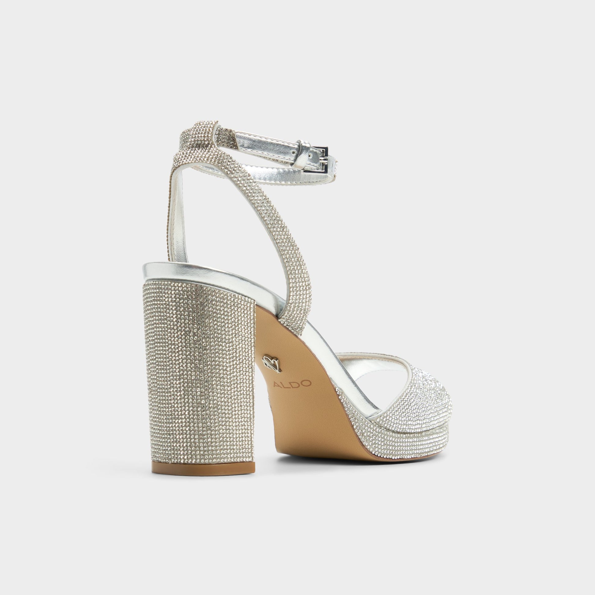 Three-quarter angle of Silver Alluring Strappy heeled sandal's back side