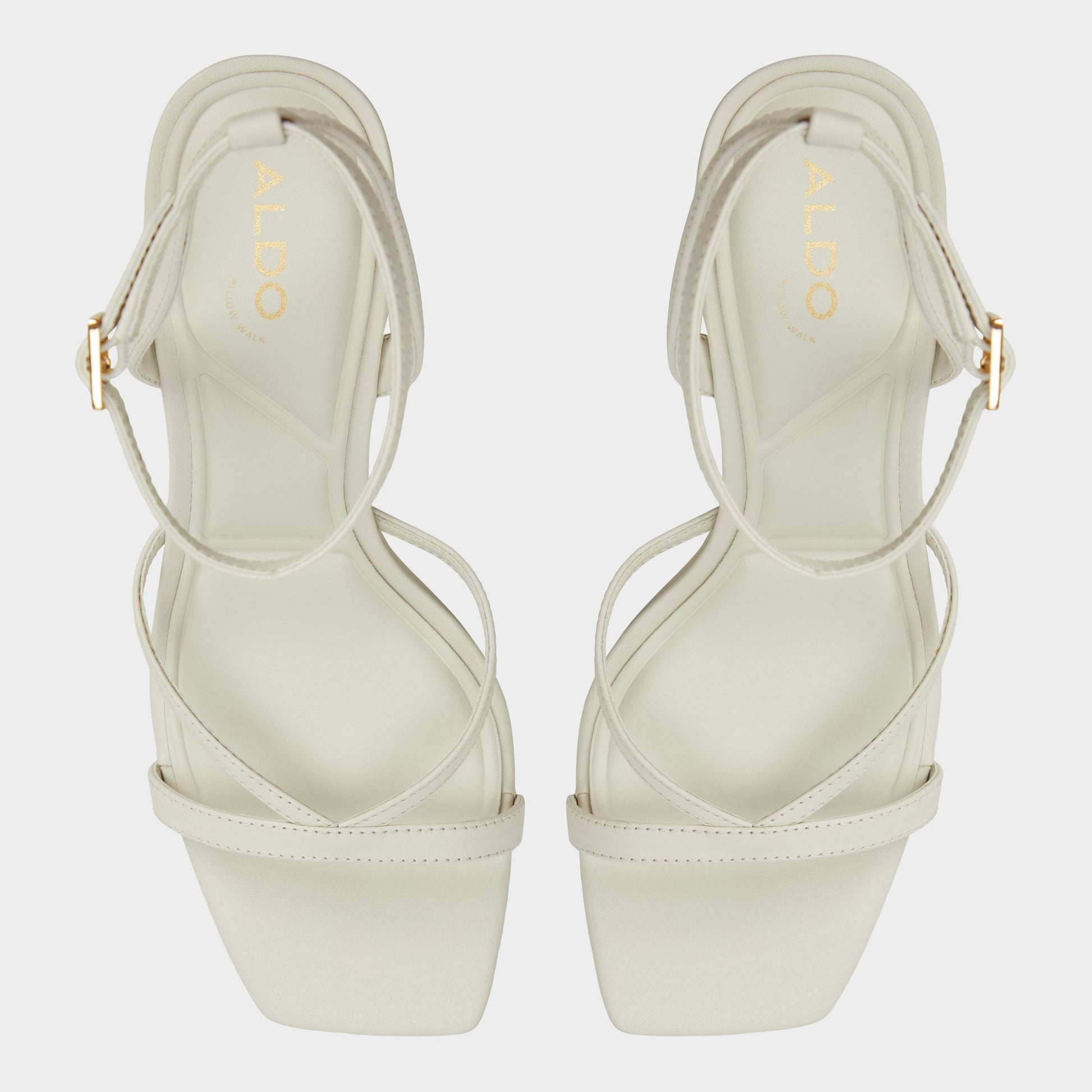 Top-down view of the White/Bone Stellare Strappy heeled sandal