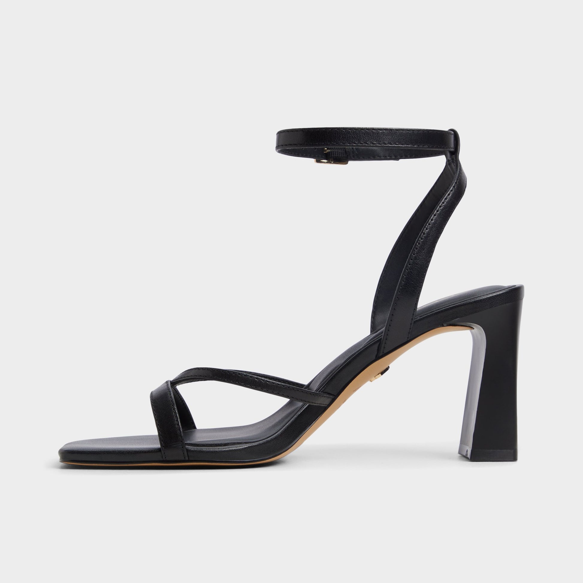 Side view of Other Black Stellare Strappy heeled sandal