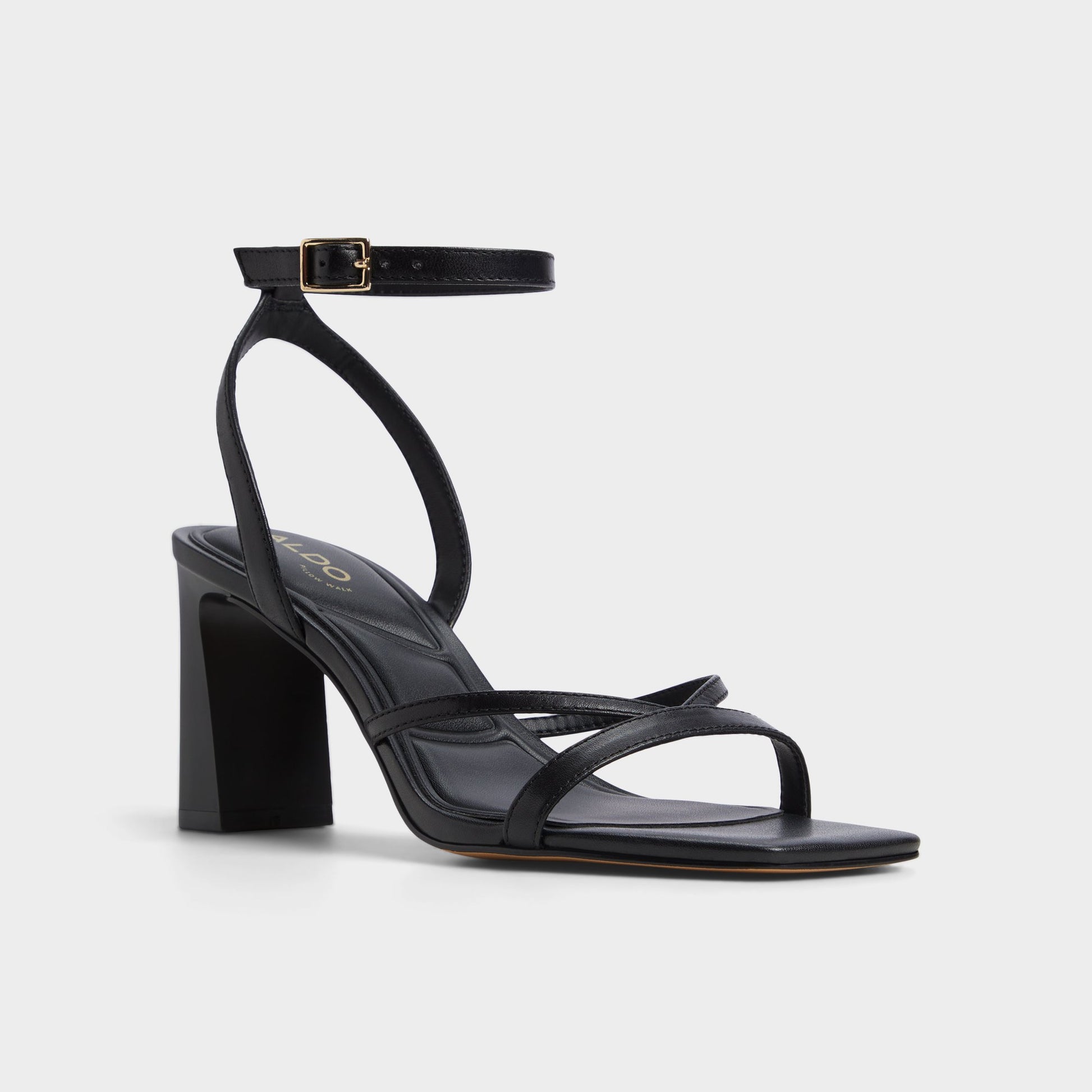 Three-quarter angle of Other Black Stellare Strappy heeled sandal's front side