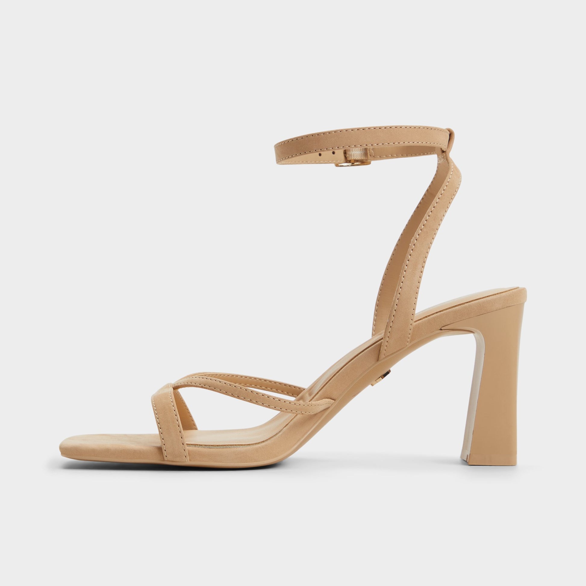 Side view of Beige Stellare Strappy heeled sandal
