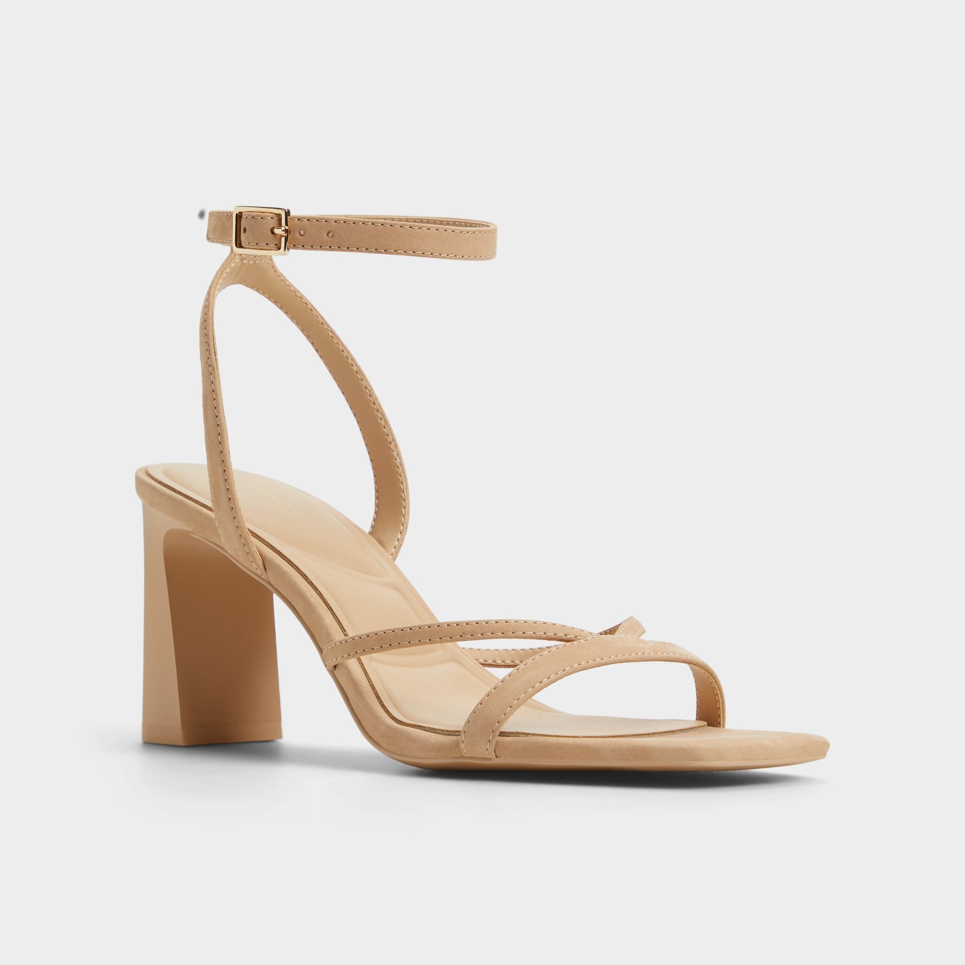 Three-quarter angle of Beige Stellare Strappy heeled sandal's front side