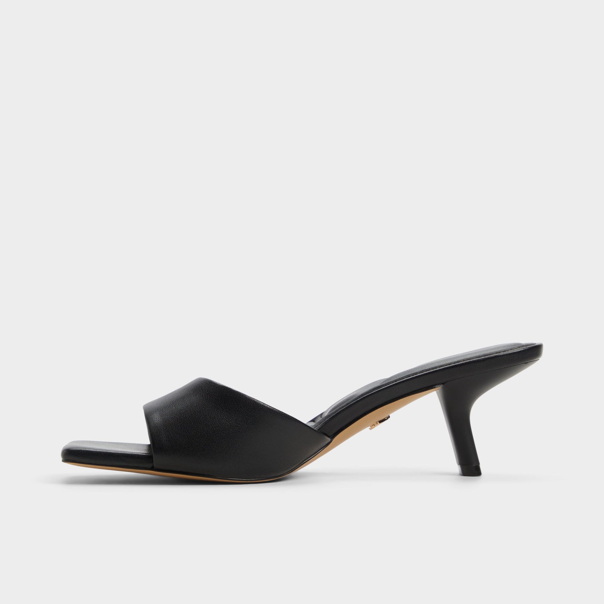 Side view of Black Enchanting Heeled mule