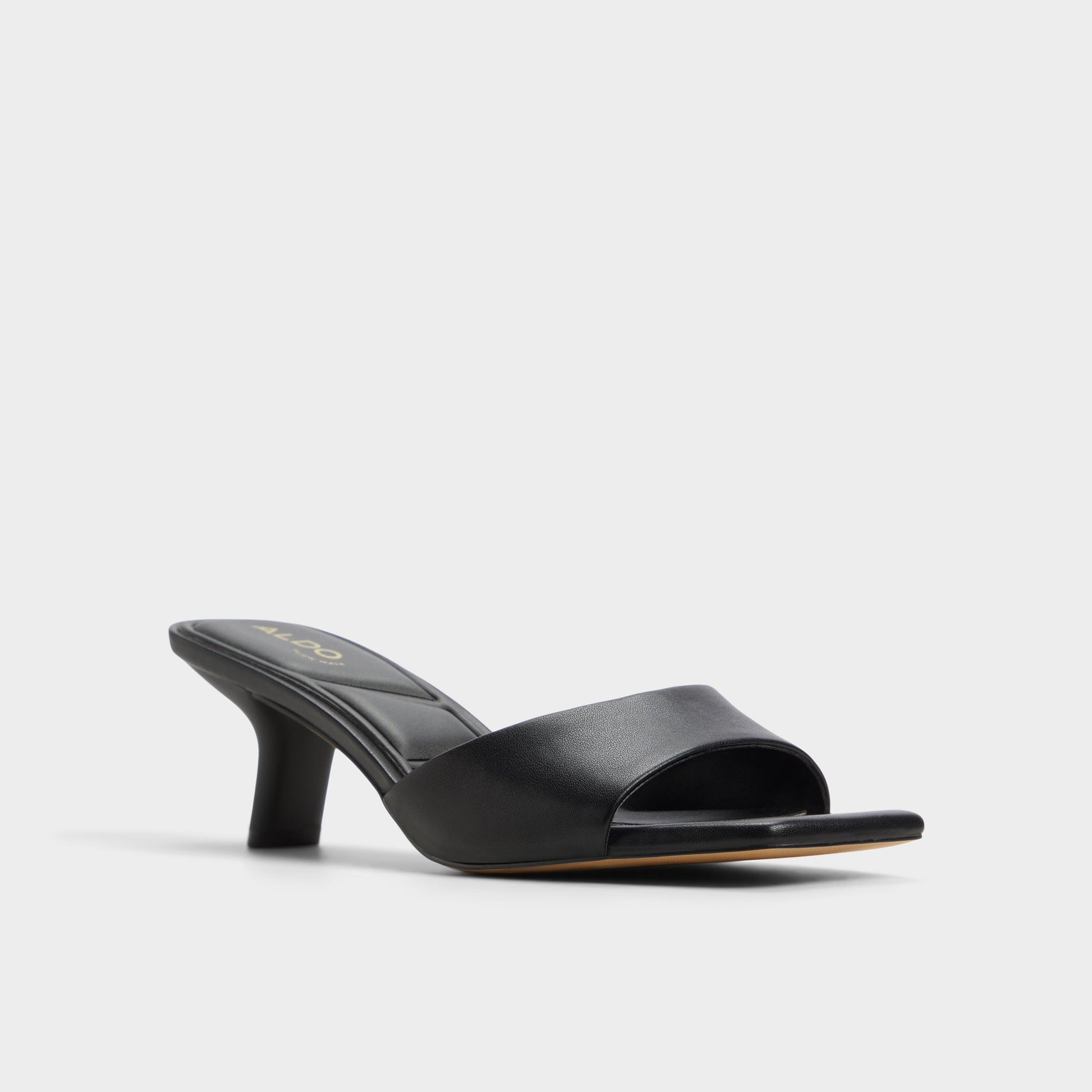 Three-quarter angle of Black Enchanting Heeled mule's front side