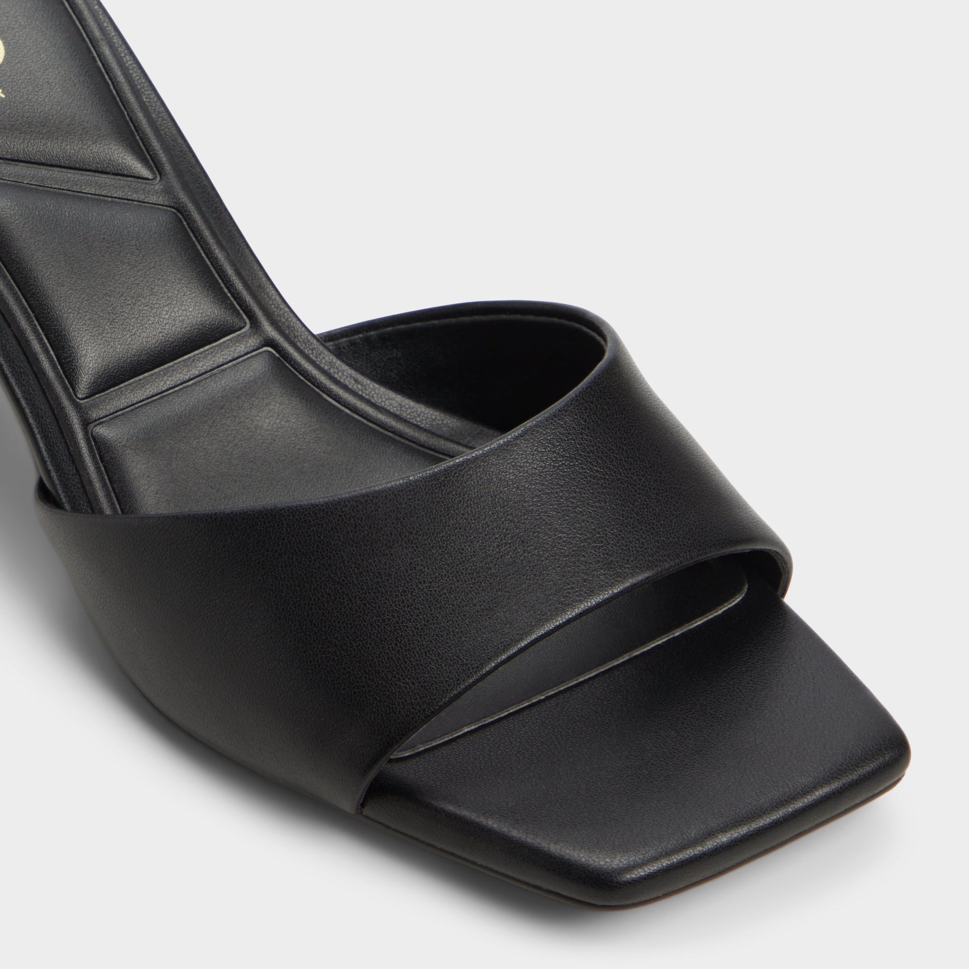 Close-up of the Black Enchanting Heeled mule