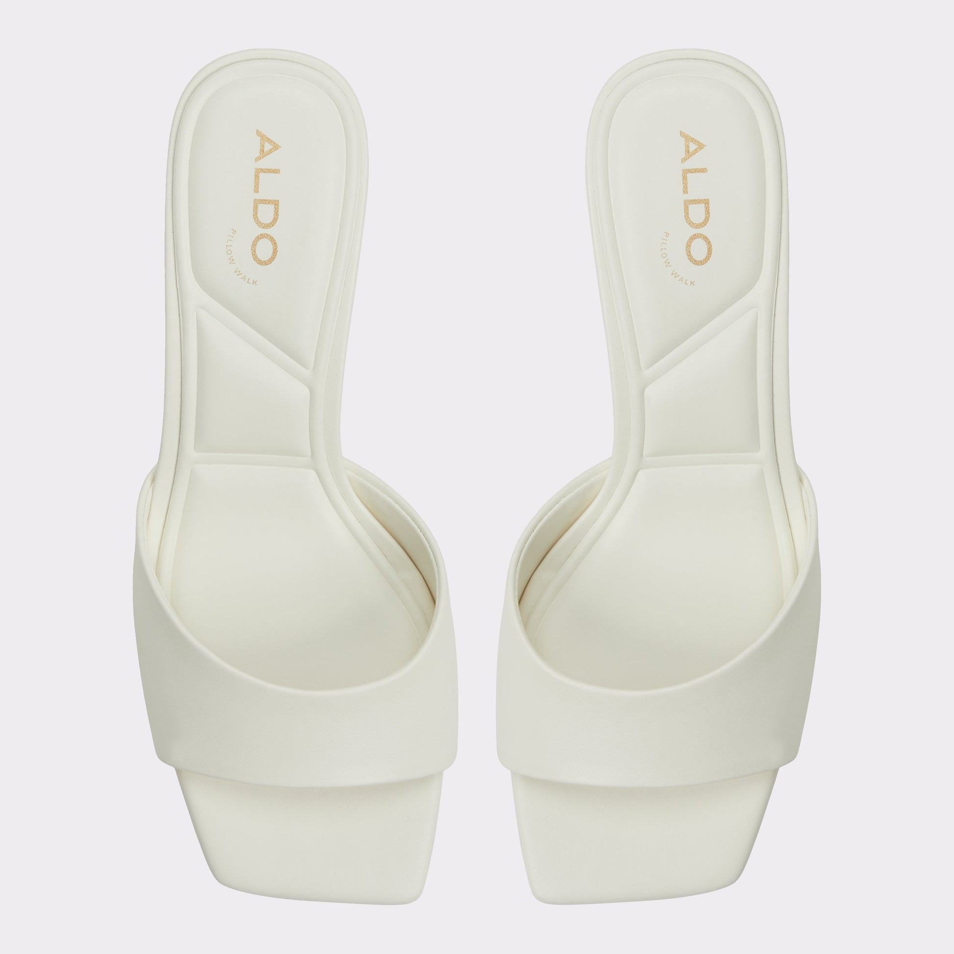 Top-down view of the White Enchanting Heeled mule