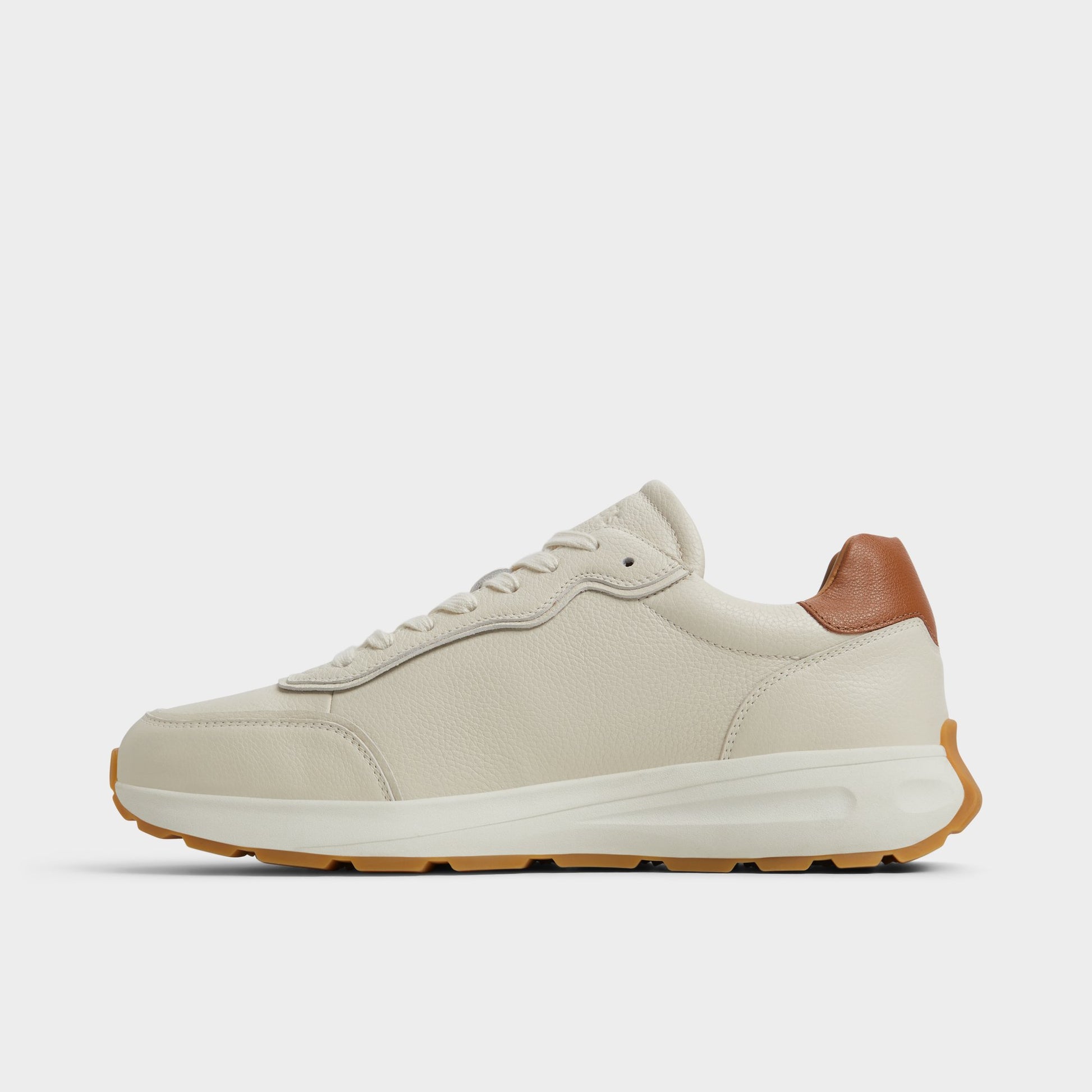 Side view of Ivory Alessio Jogger sneaker