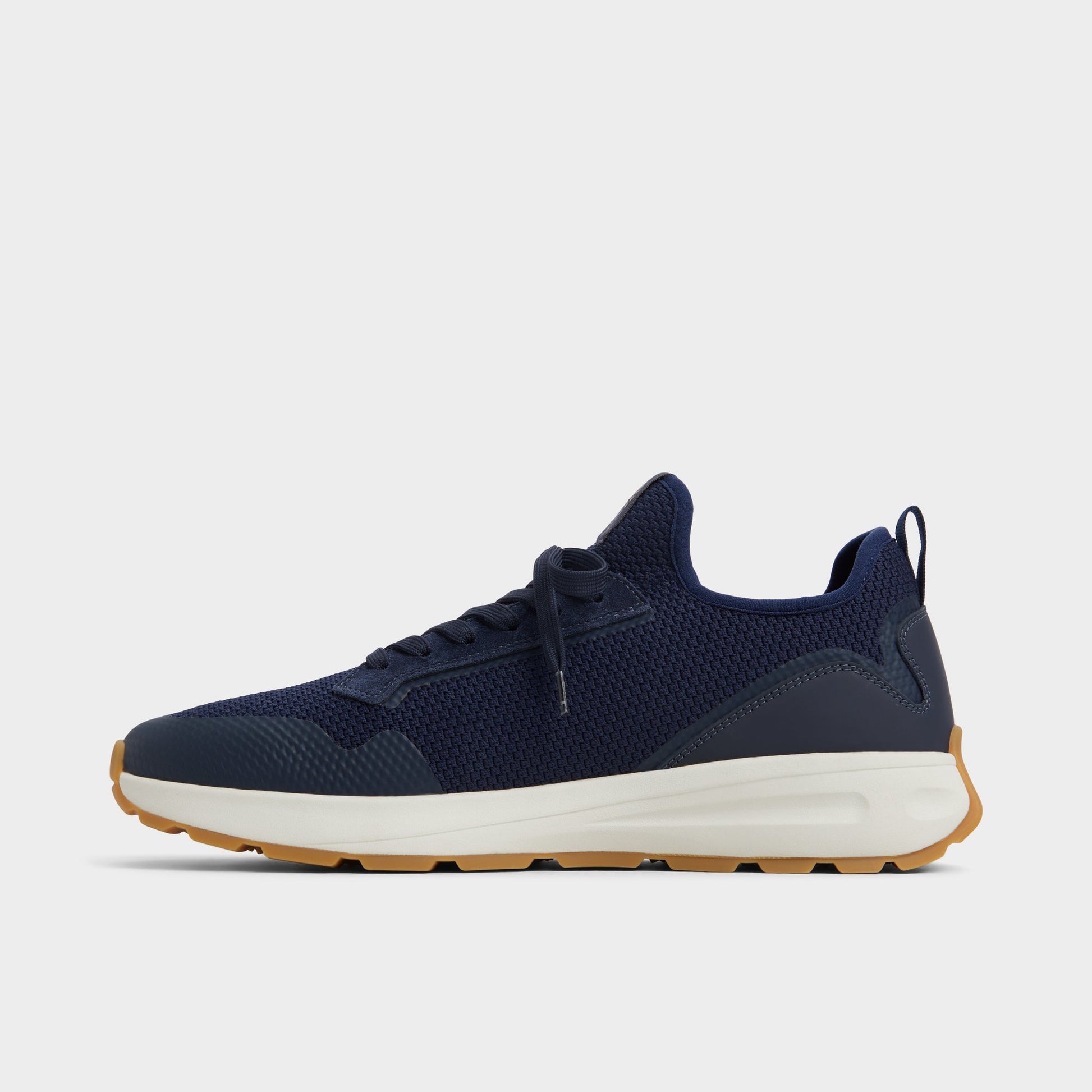 Side view of Navy Garrick Jogger sneaker