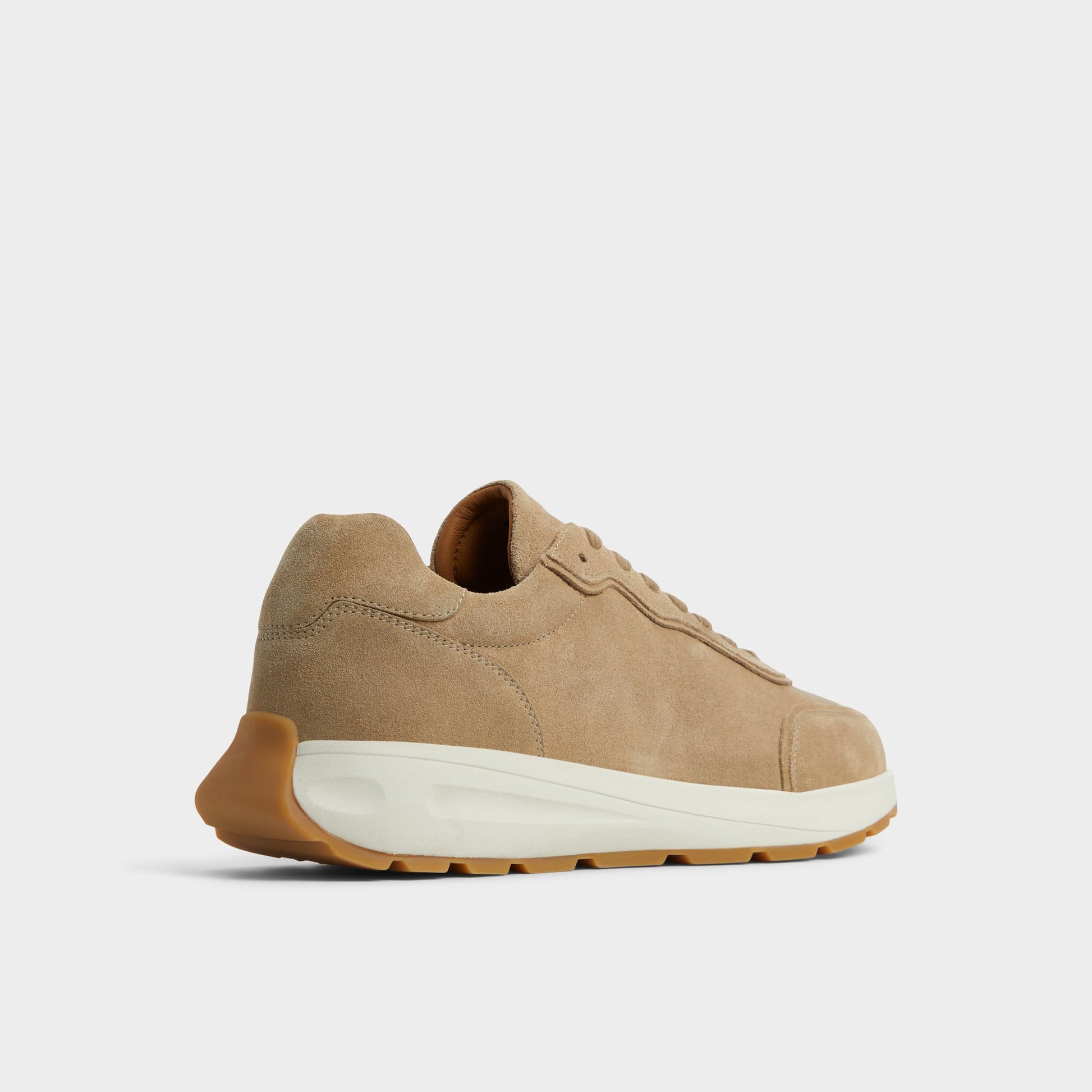 Three-quarter angle of Taupe Alessio Jogger sneaker's back side