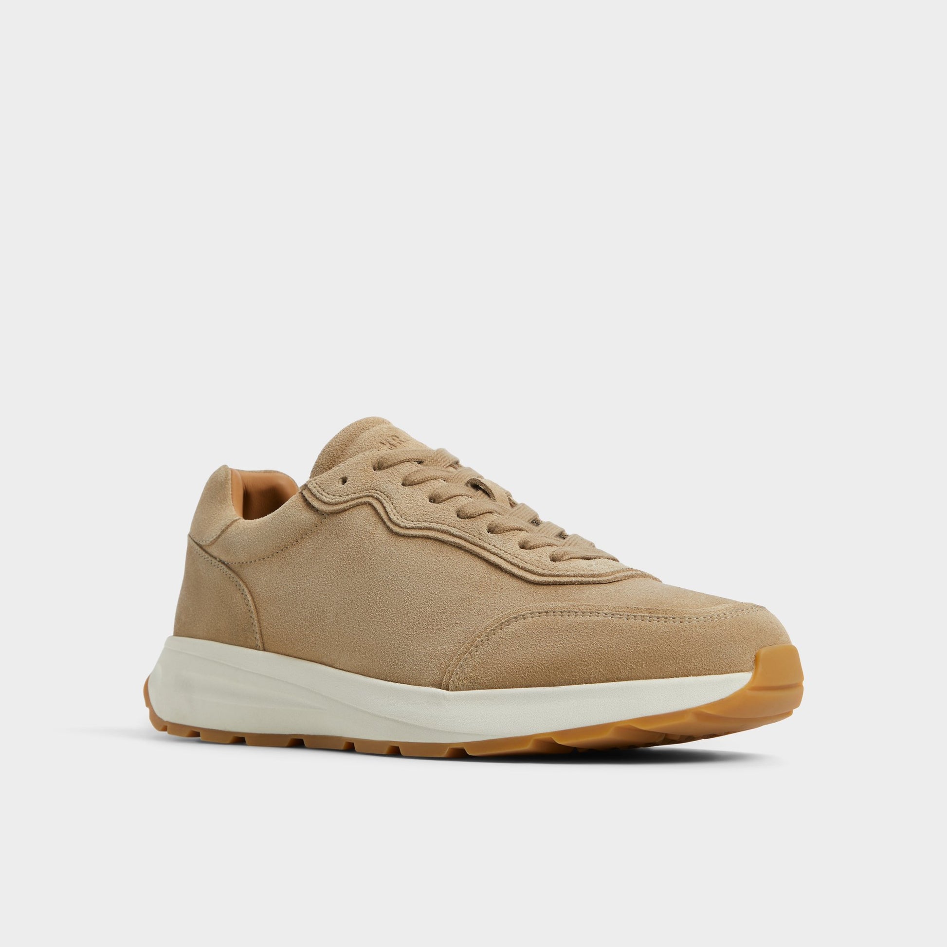 Three-quarter angle of Taupe Alessio Jogger sneaker's front side