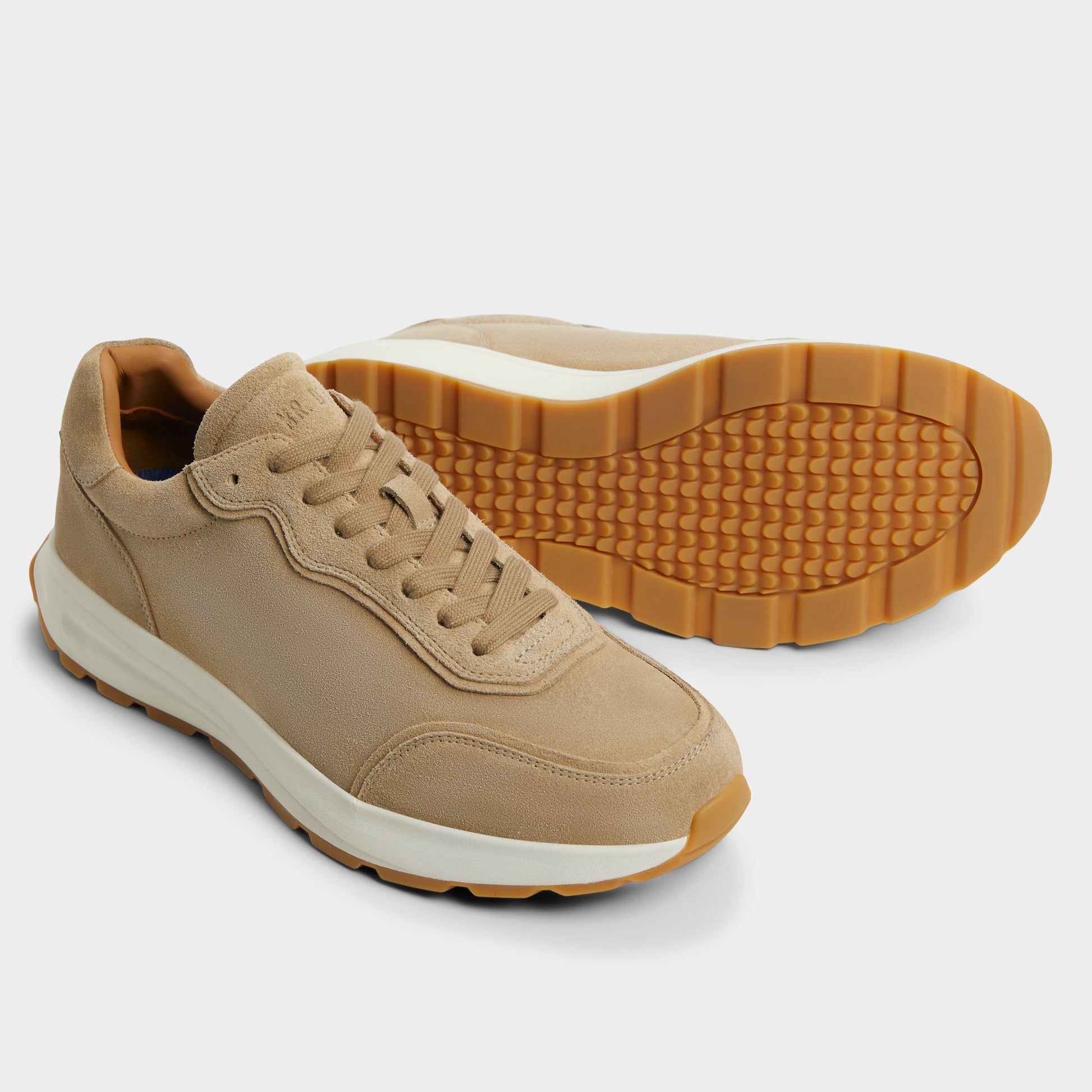 Highlighted view of a pair of Taupe Alessio Jogger sneakers