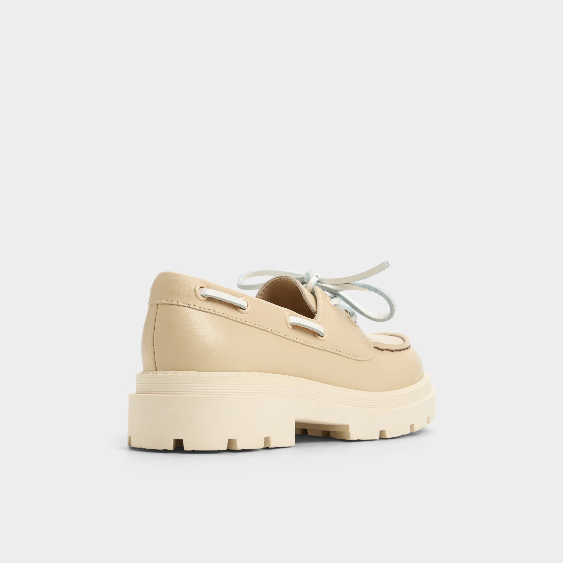 Three-quarter angle of Beige Seaport Boat shoe's back side