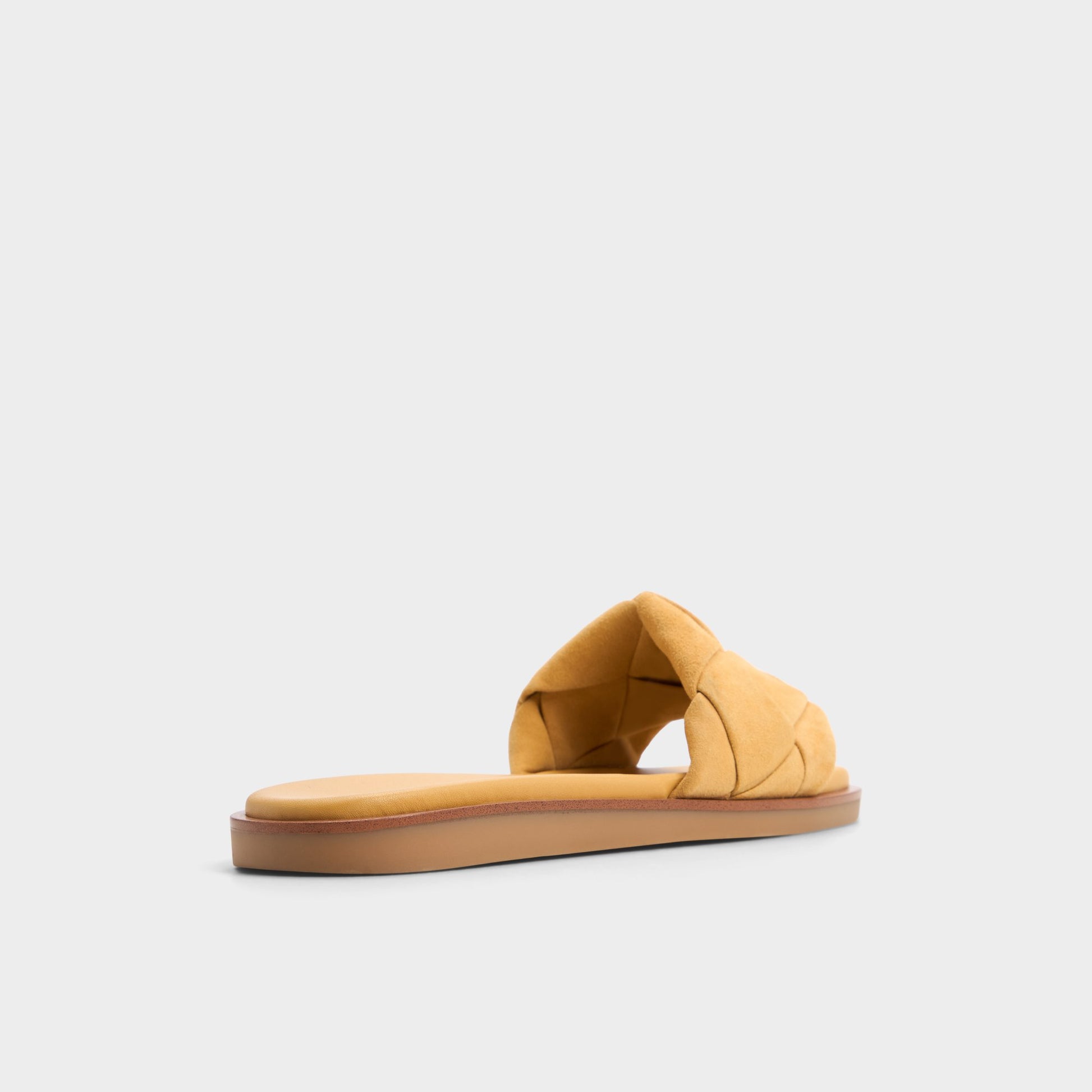 Three-quarter angle of Other Yellow Esterelle Slide sandal's back side