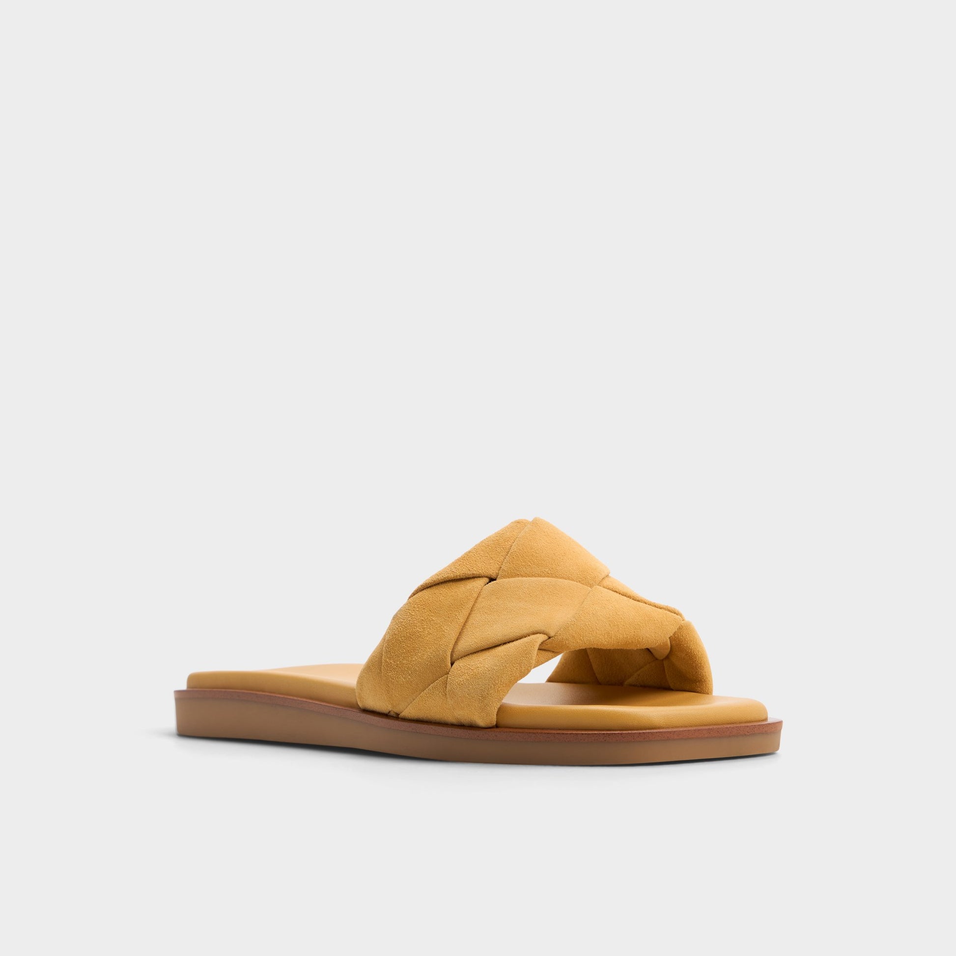 Three-quarter angle of Other Yellow Esterelle Slide sandal's front side