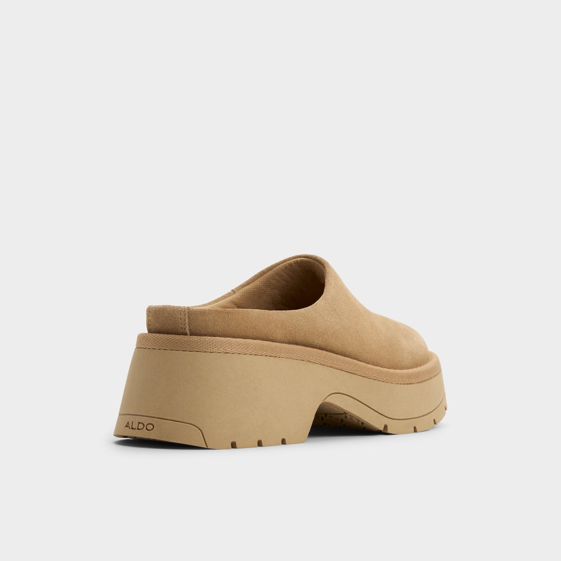Three-quarter angle of Beige Academia Heeled mule's back side