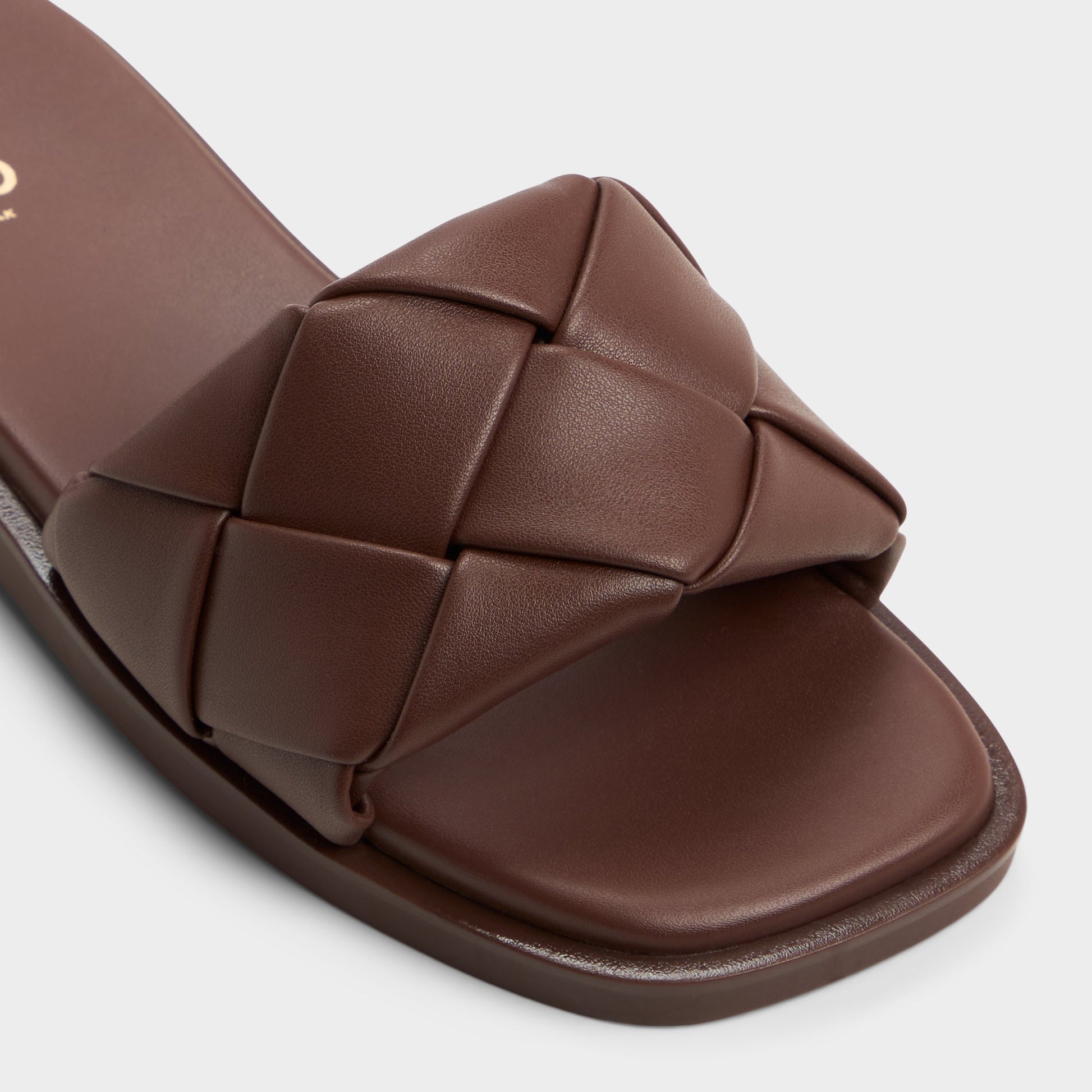 Close-up of the Dark Brown Esterelle Slide sandal