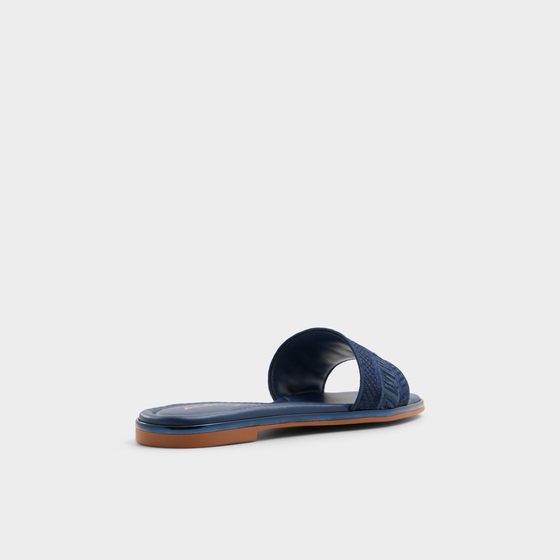 Three-quarter angle of Navy Oceania Slide sandal's back side