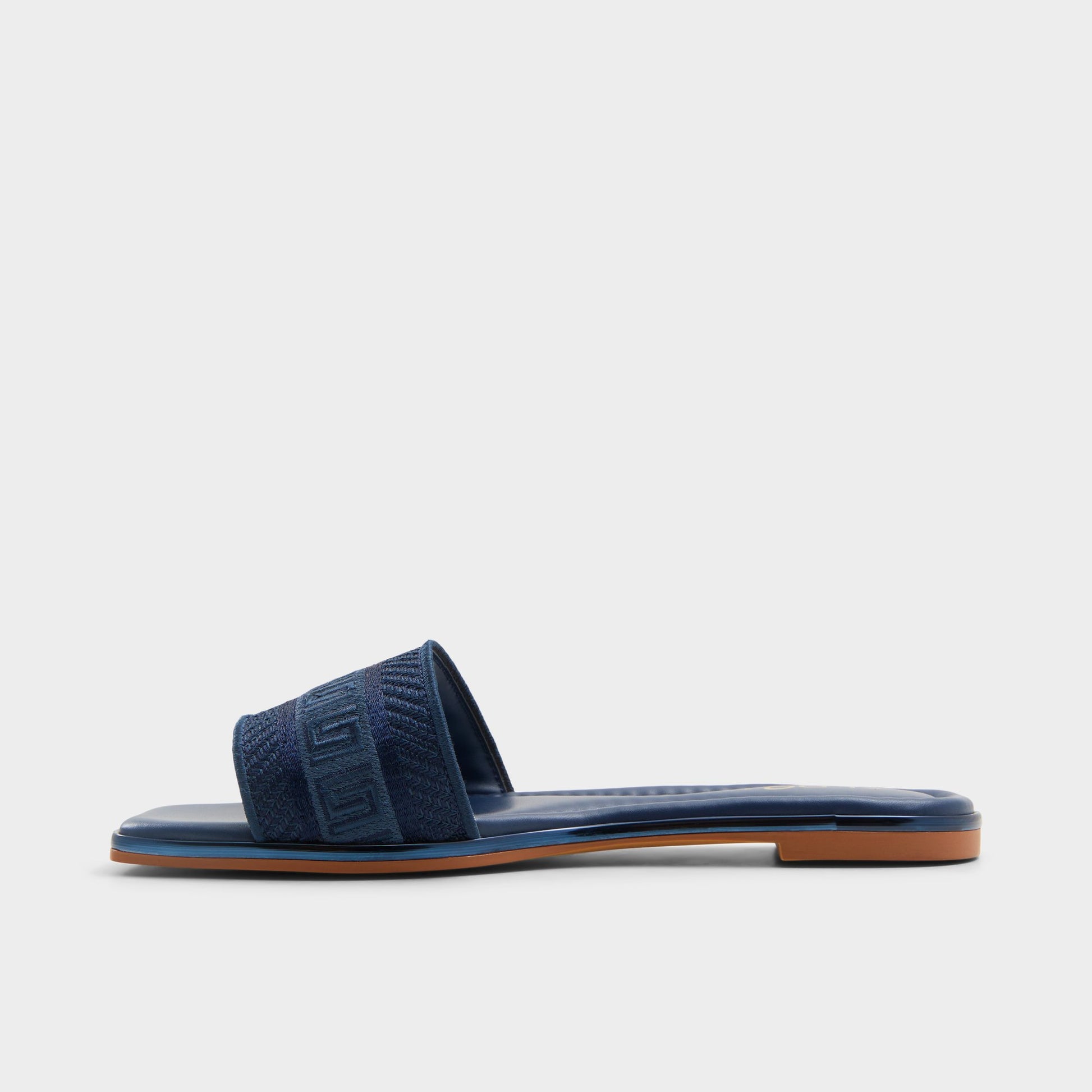 Side view of Navy Oceania Slide sandal