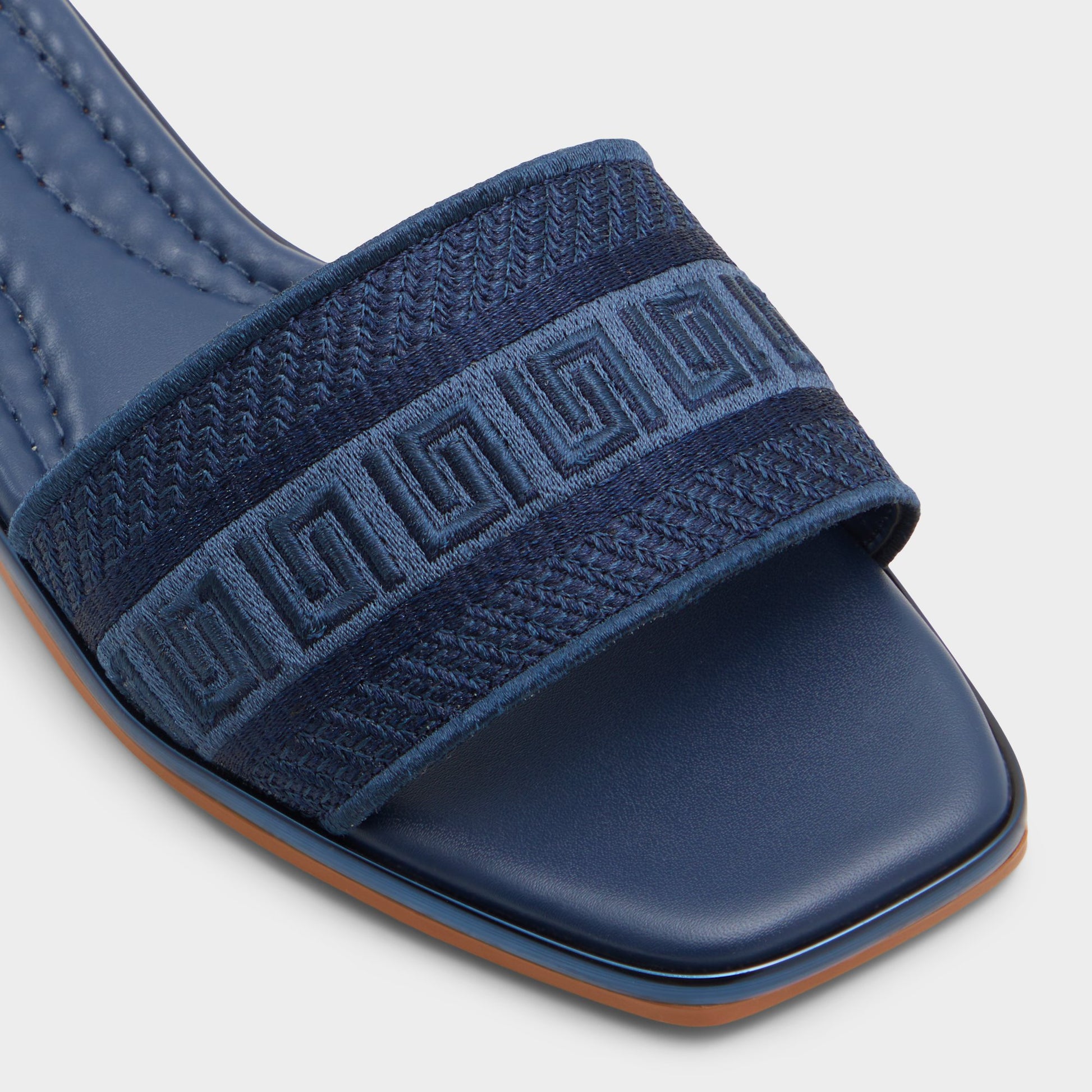 Close-up of the Navy Oceania Slide sandal