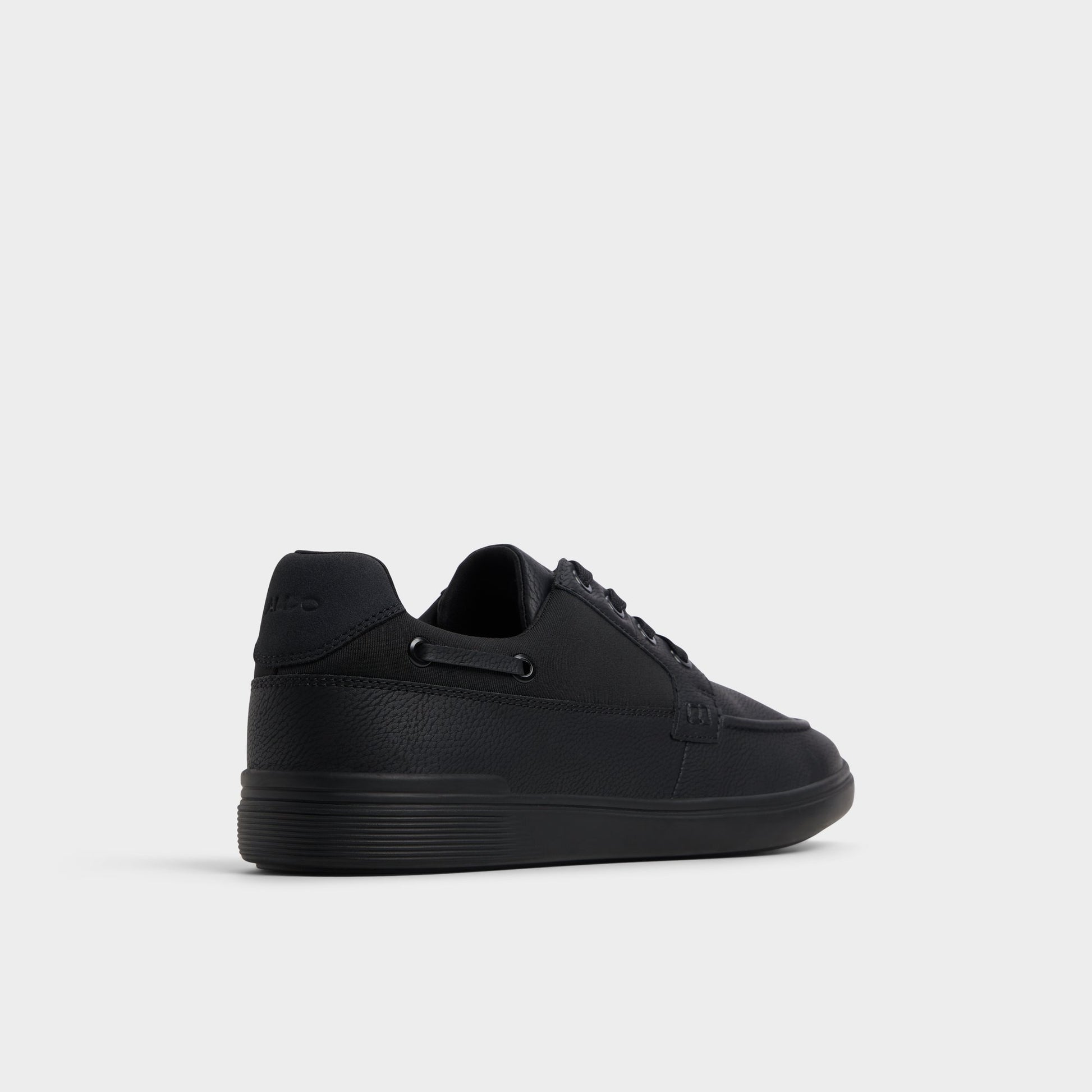 Three-quarter angle of Black/Black Tazz Low top sneaker's back side
