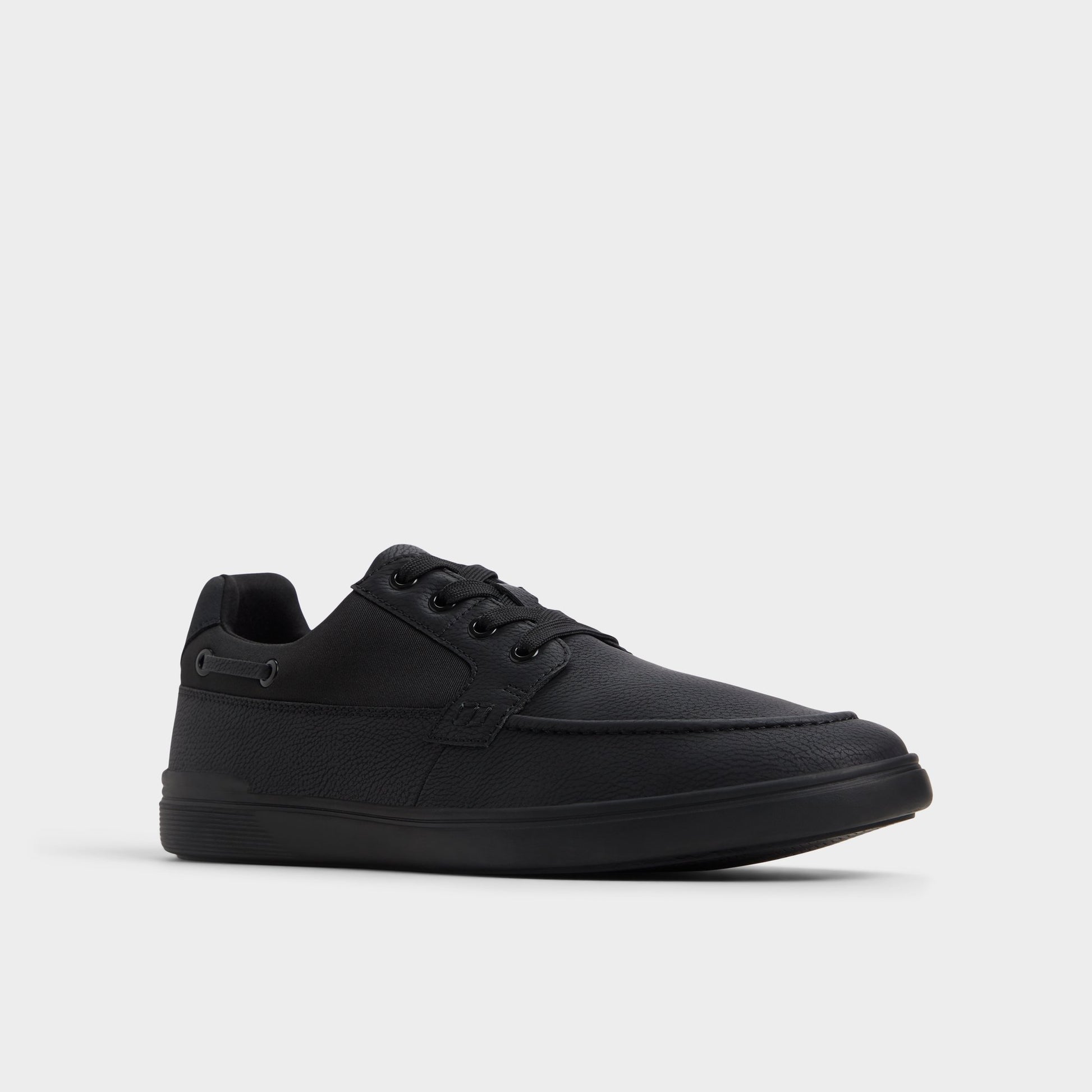 Three-quarter angle of Black/Black Tazz Low top sneaker's front side