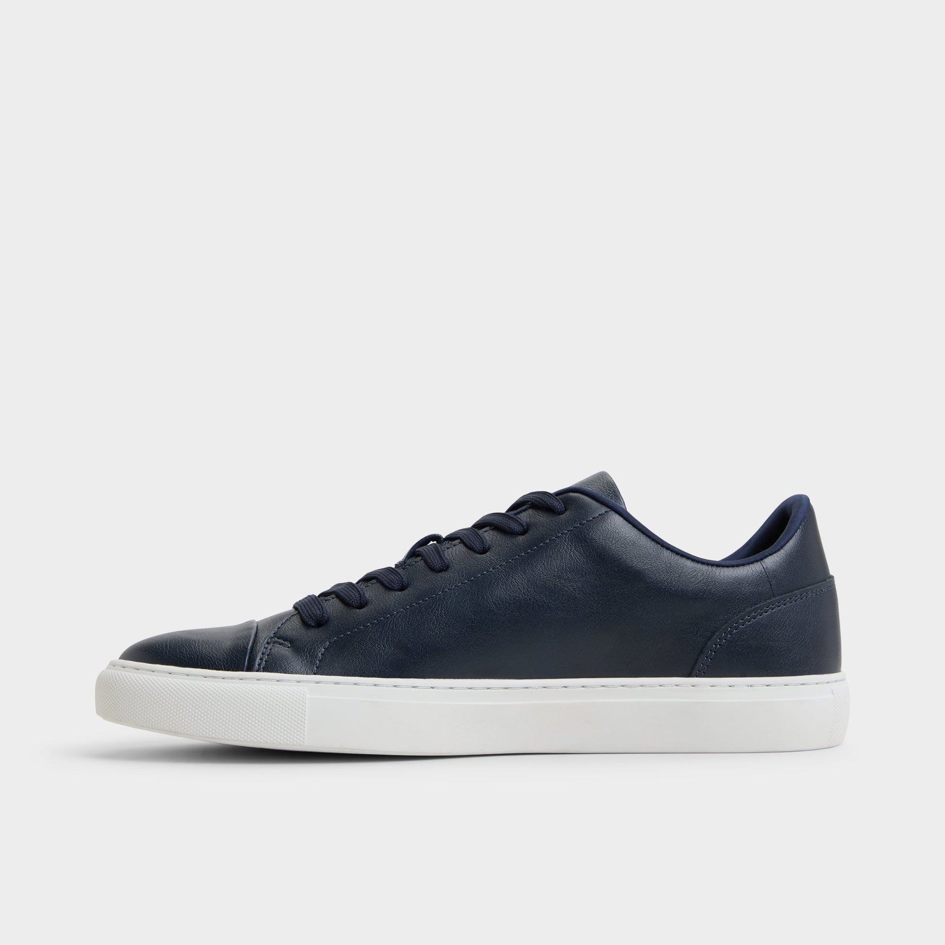 Side view of Navy Belford Low top sneaker