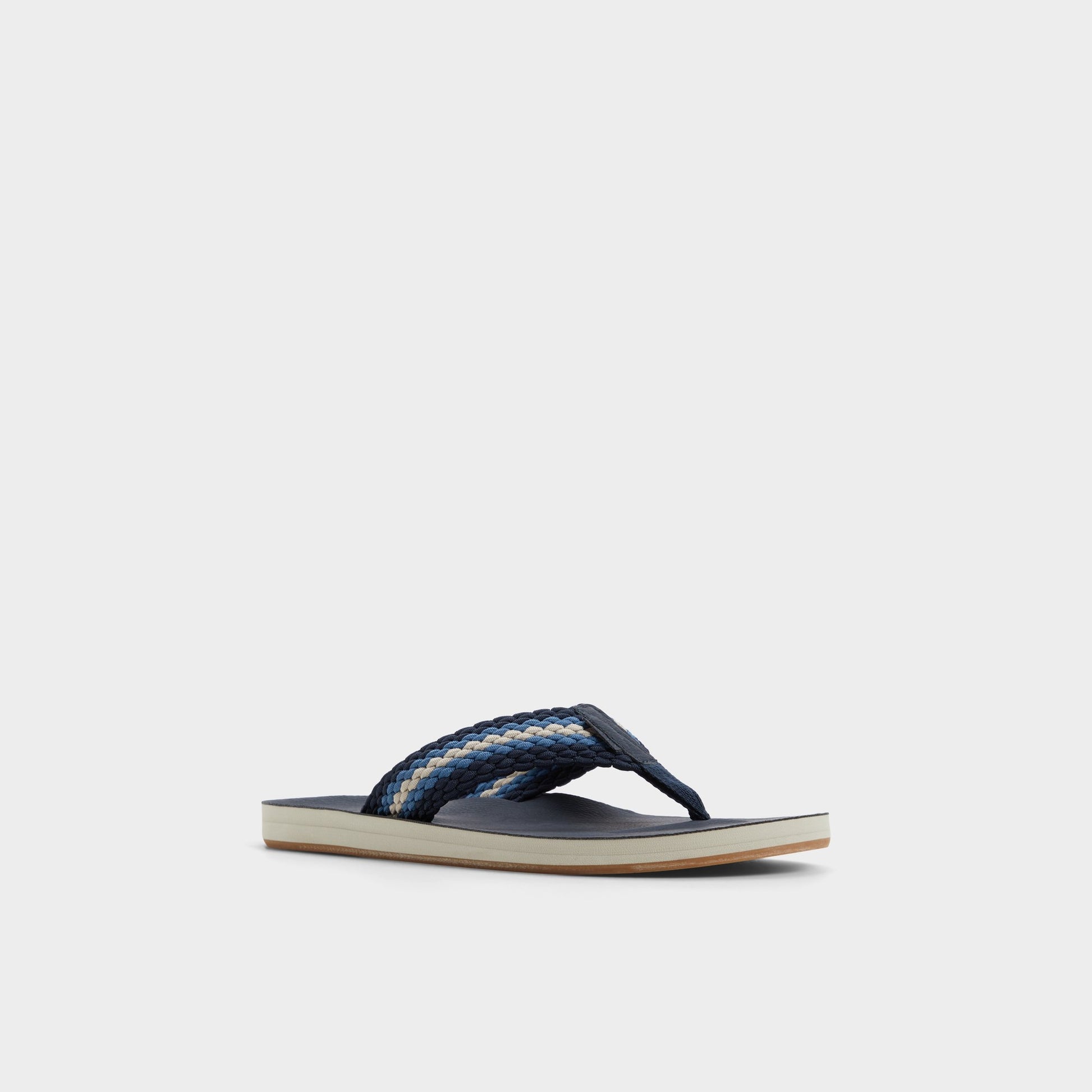 Three-quarter angle of Slate Blue Adede Flip flop's front side