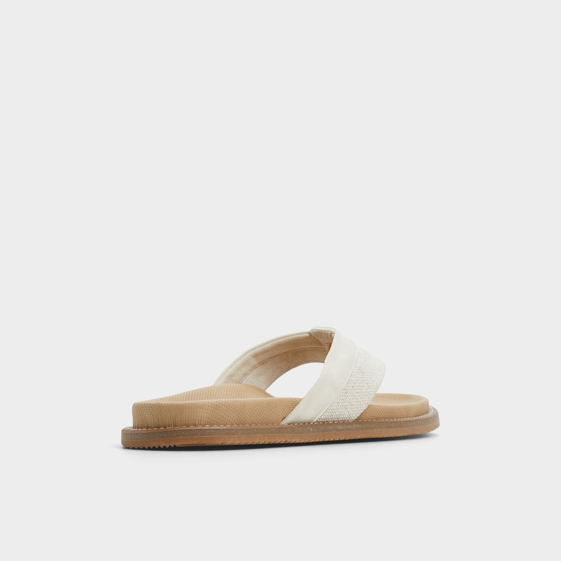 Three-quarter angle of Bone Beachbreeze Slide sandal's back side