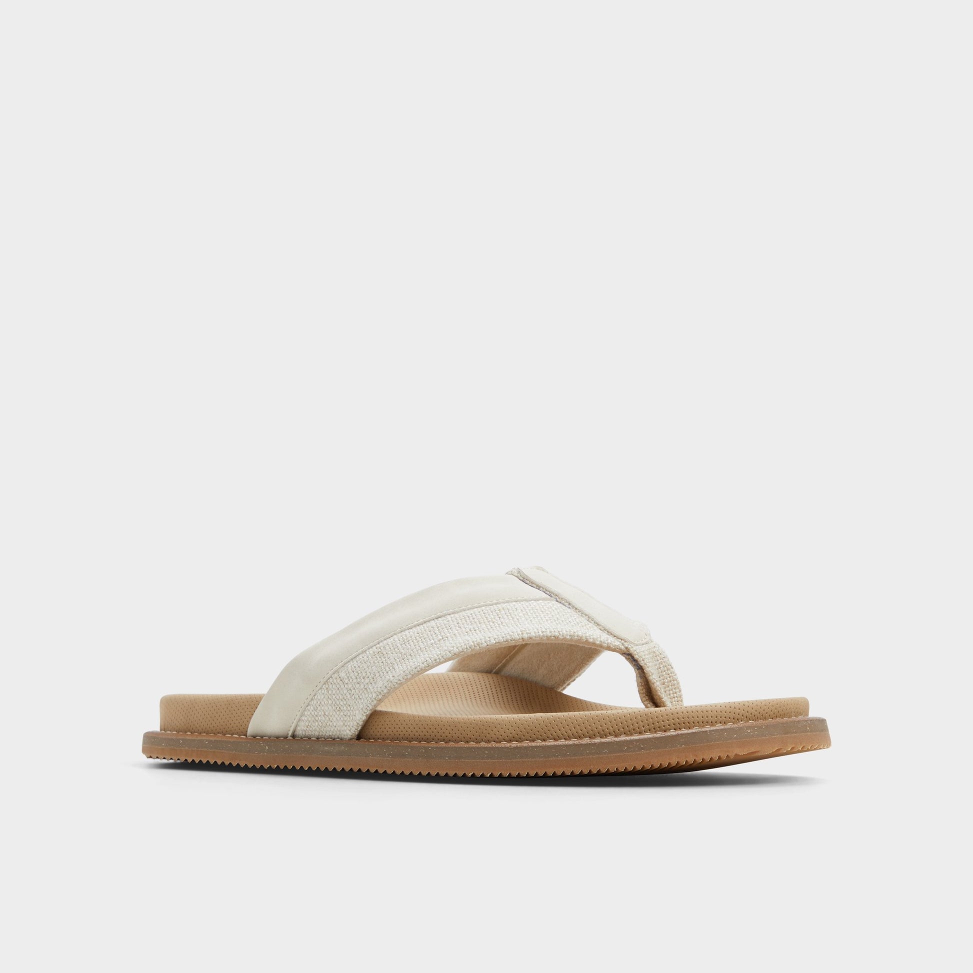 Three-quarter angle of Bone Beachbreeze Slide sandal's front side