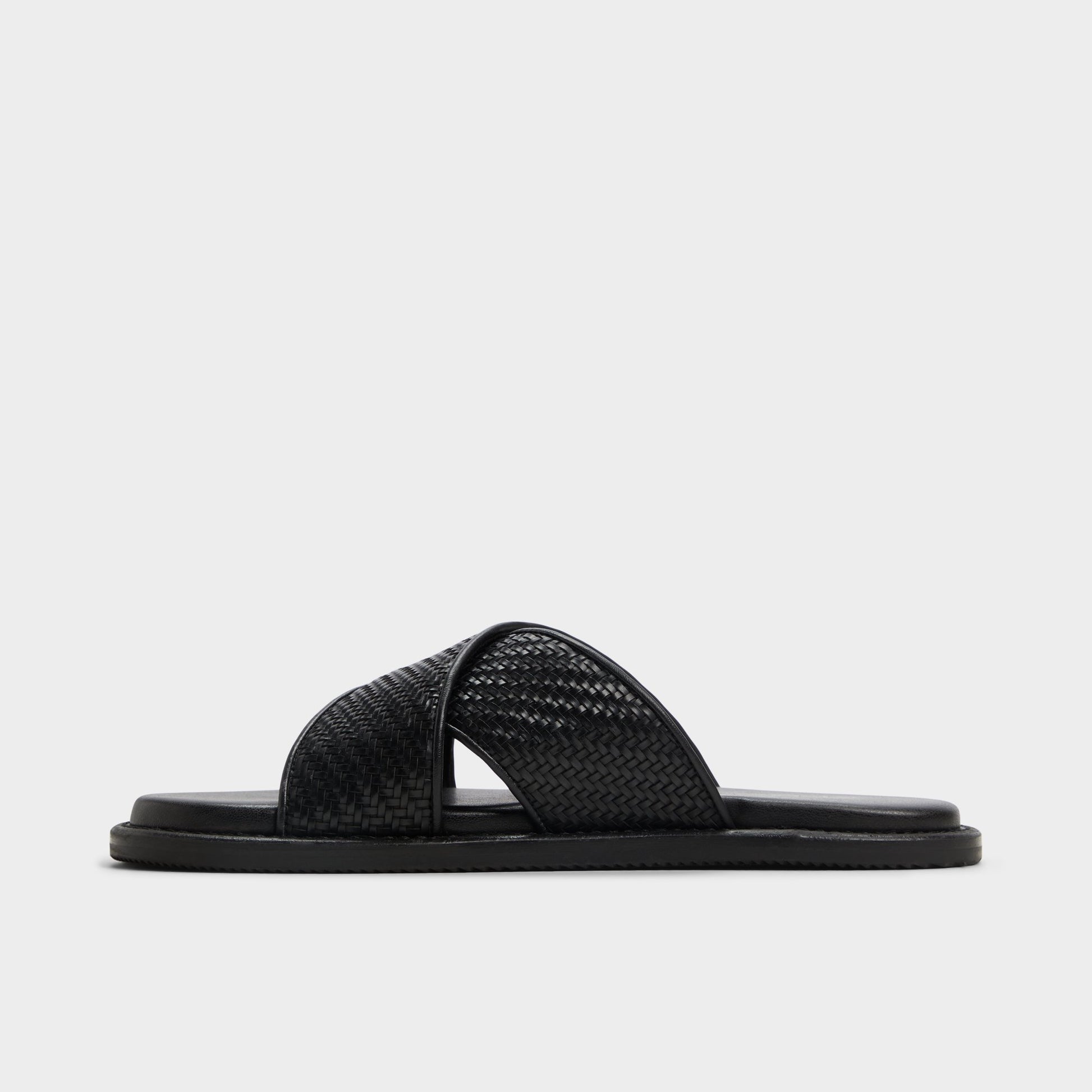 Side view of Black Tarik Slide sandal