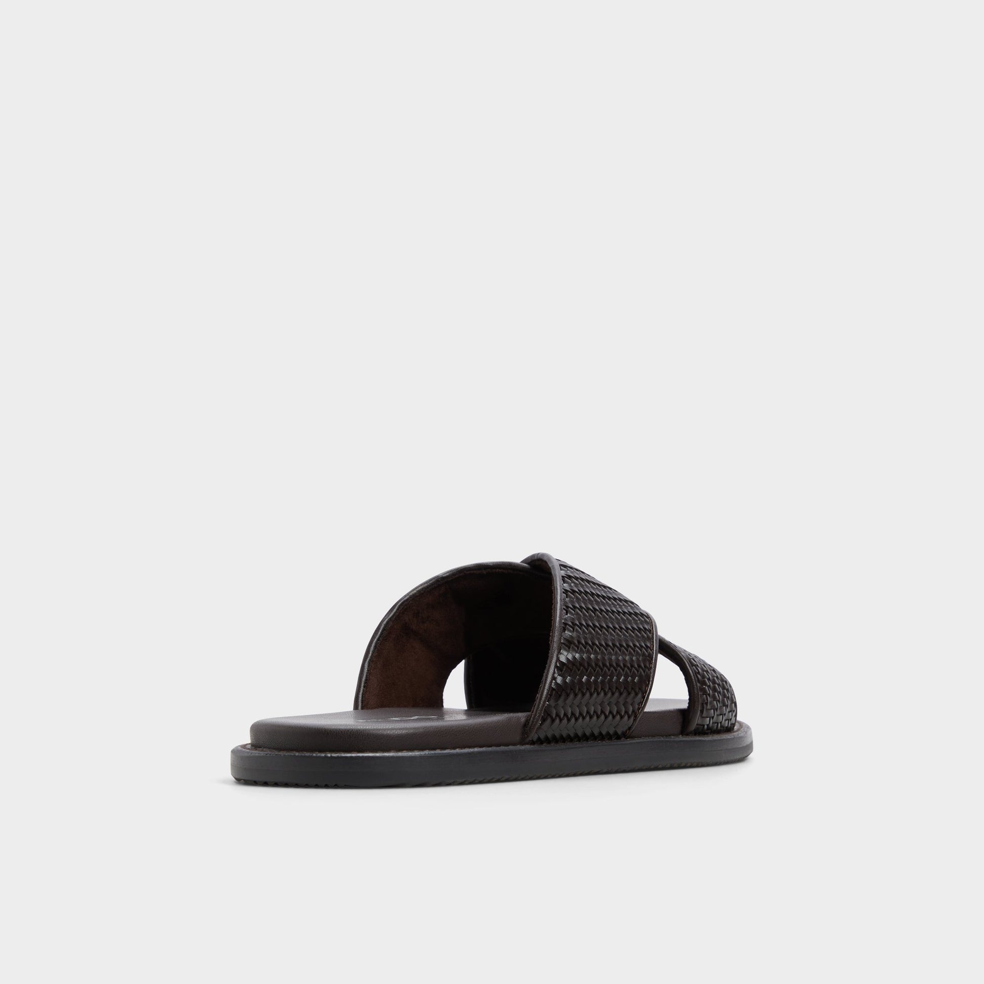 Three-quarter angle of Dark Brown Tarik Slide sandal's back side