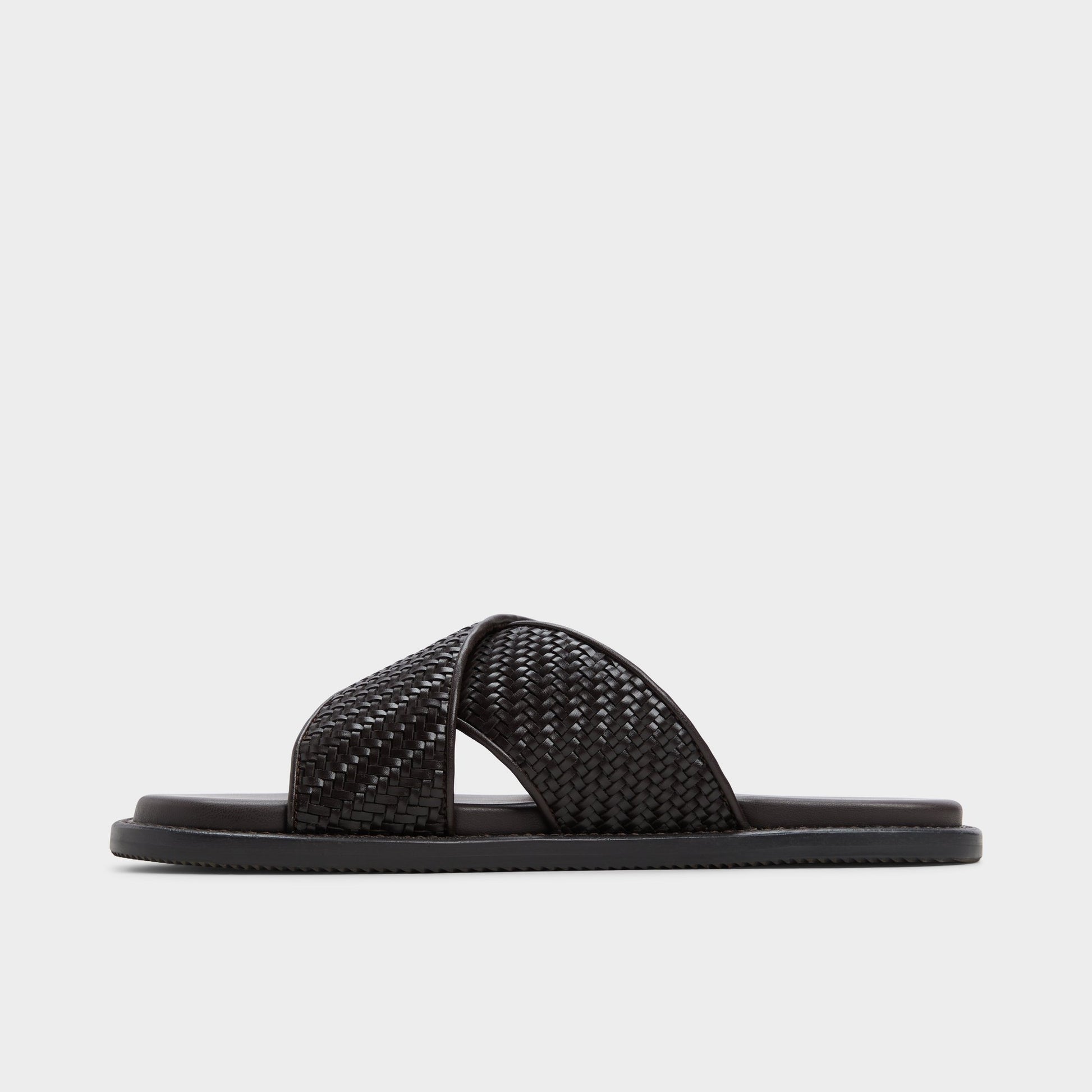 Side view of Dark Brown Tarik Slide sandal