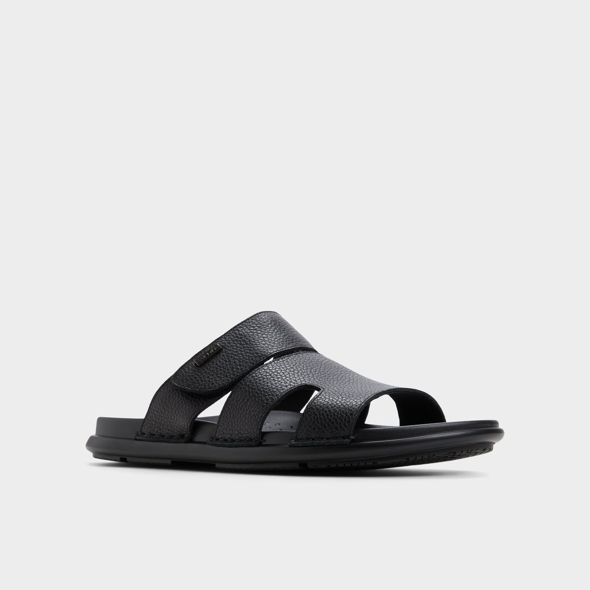 Three-quarter angle of Black Windham Slide sandal's front side