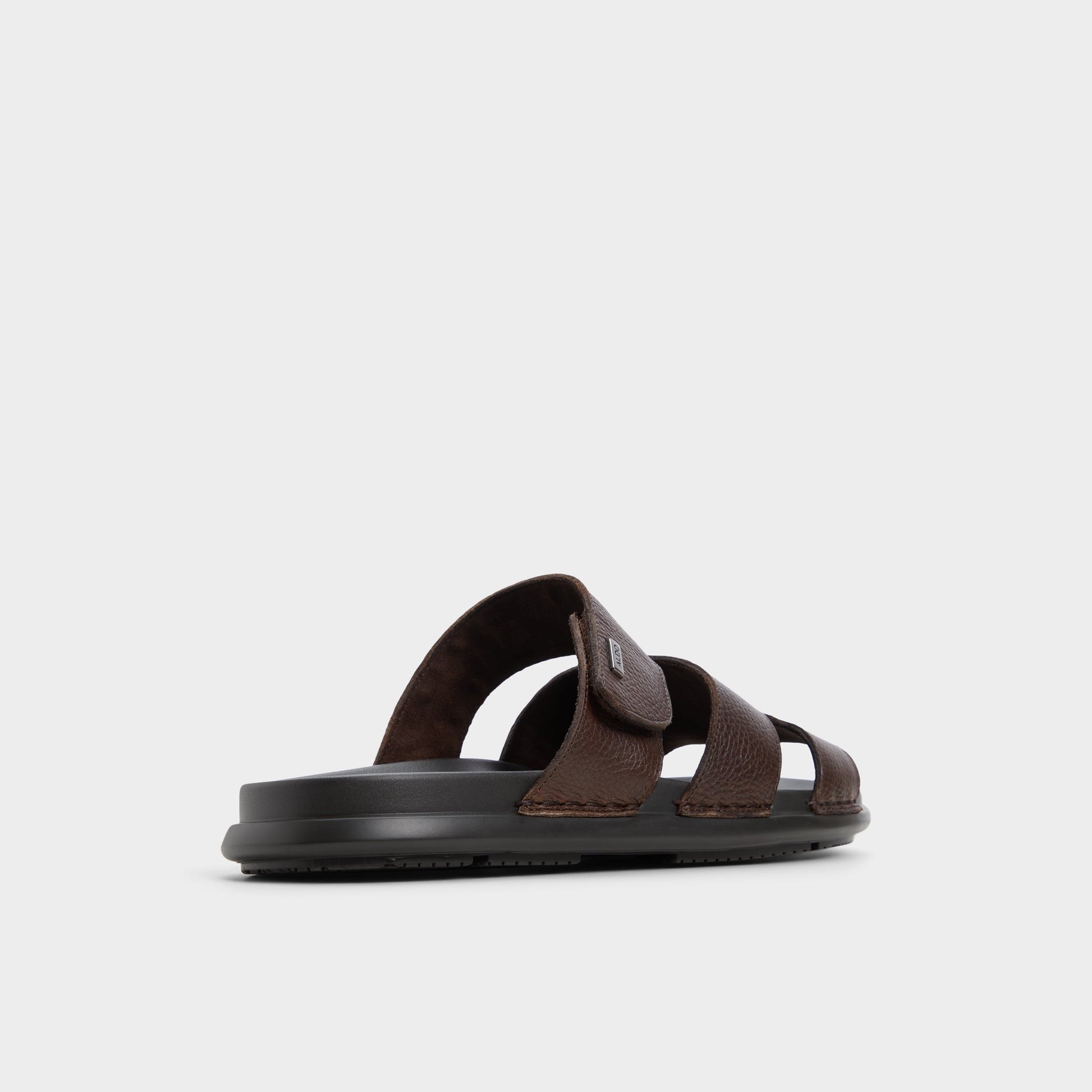 Three-quarter angle of Dark Brown Windham Slide sandal's back side