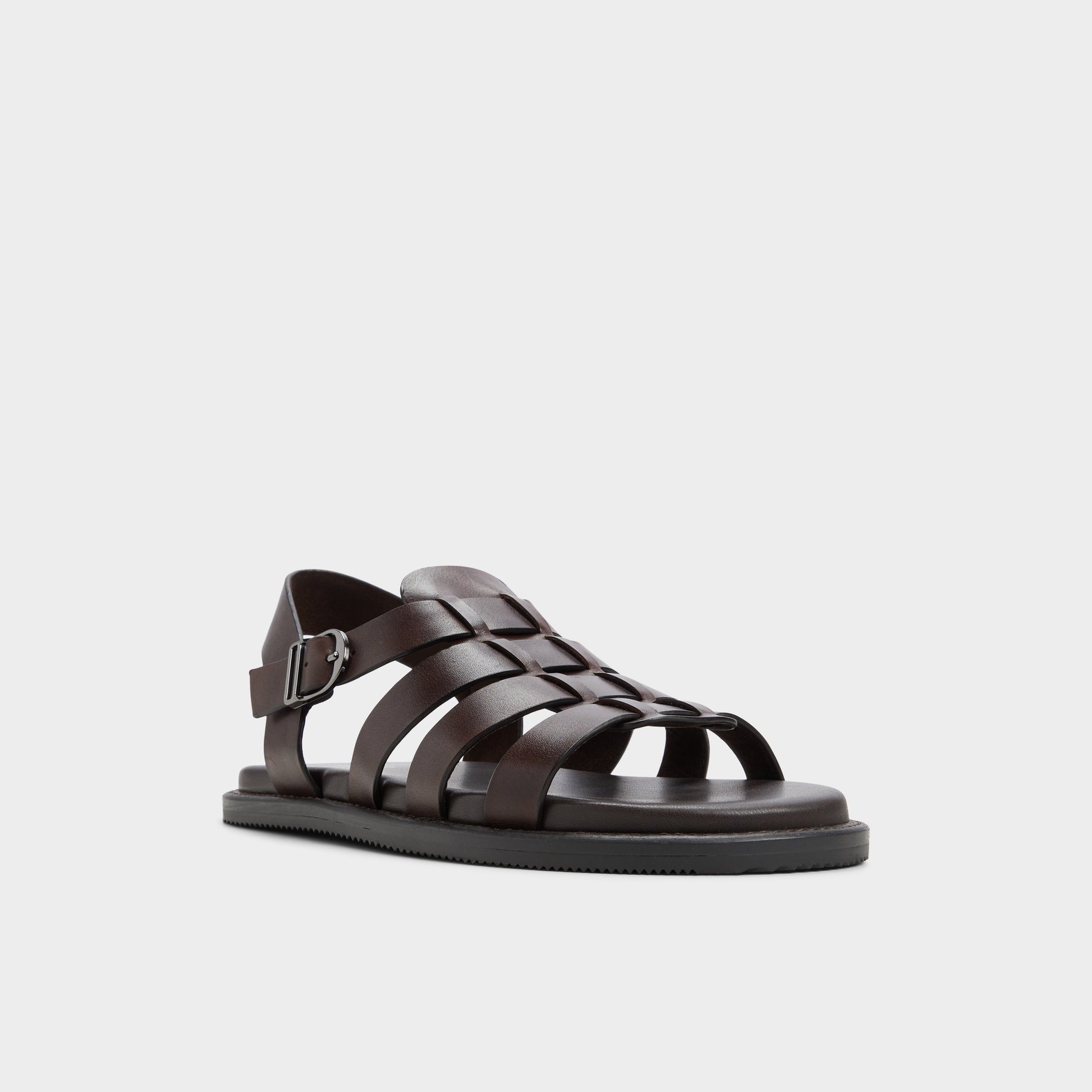 Three-quarter angle of Dark Brown Warley Strappy flat sandal's front side